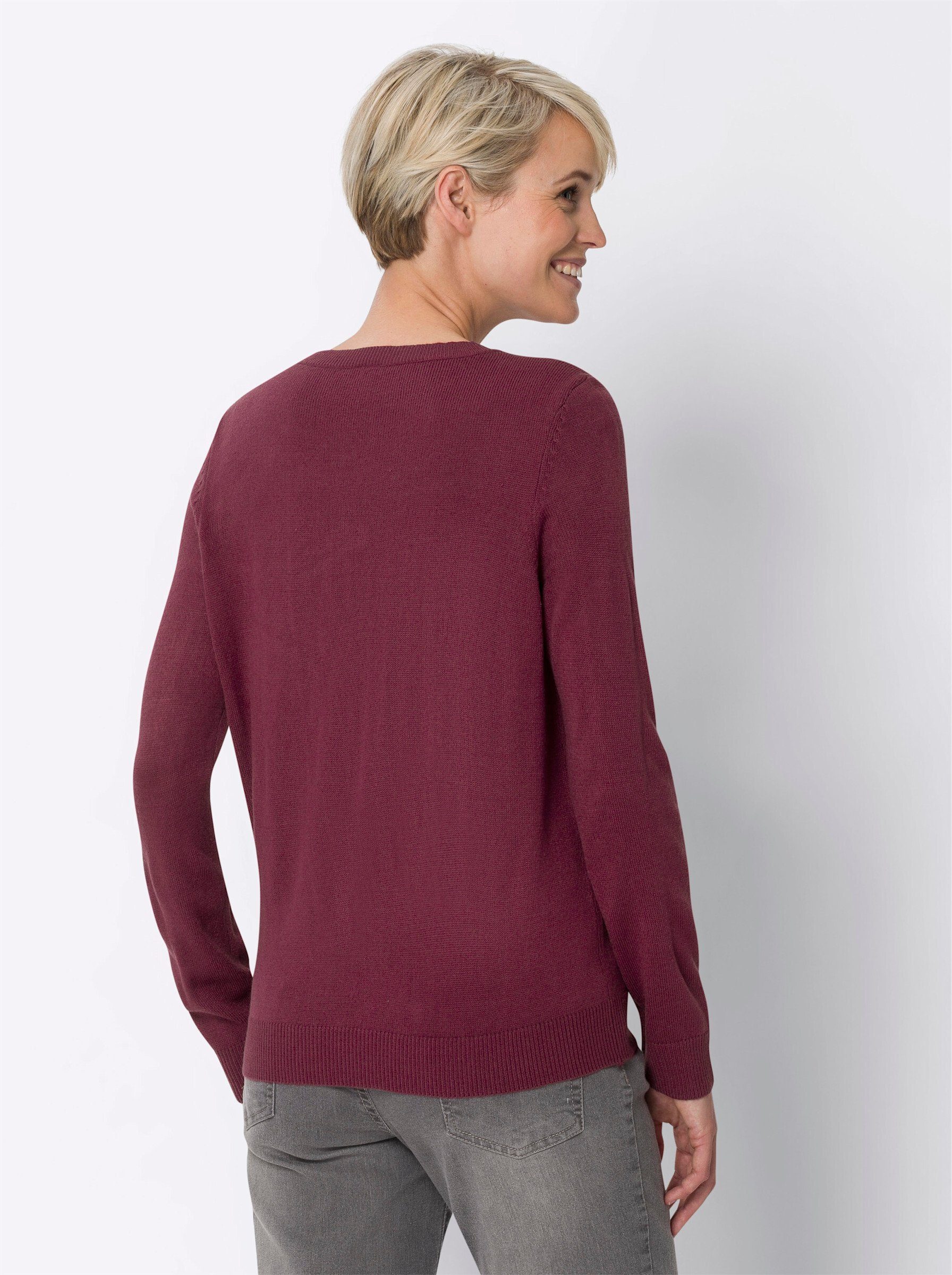 Strickpullover bordeaux an! Sieh