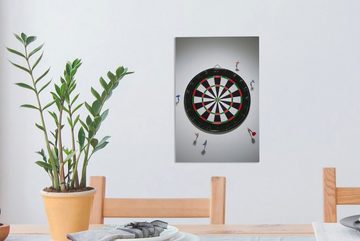 OneMillionCanvasses® Leinwandbild Dartpfeile in einer Wand um eine Dartscheibe, (1 St), Leinwandbild fertig bespannt inkl. Zackenaufhänger, Gemälde, 20x30 cm