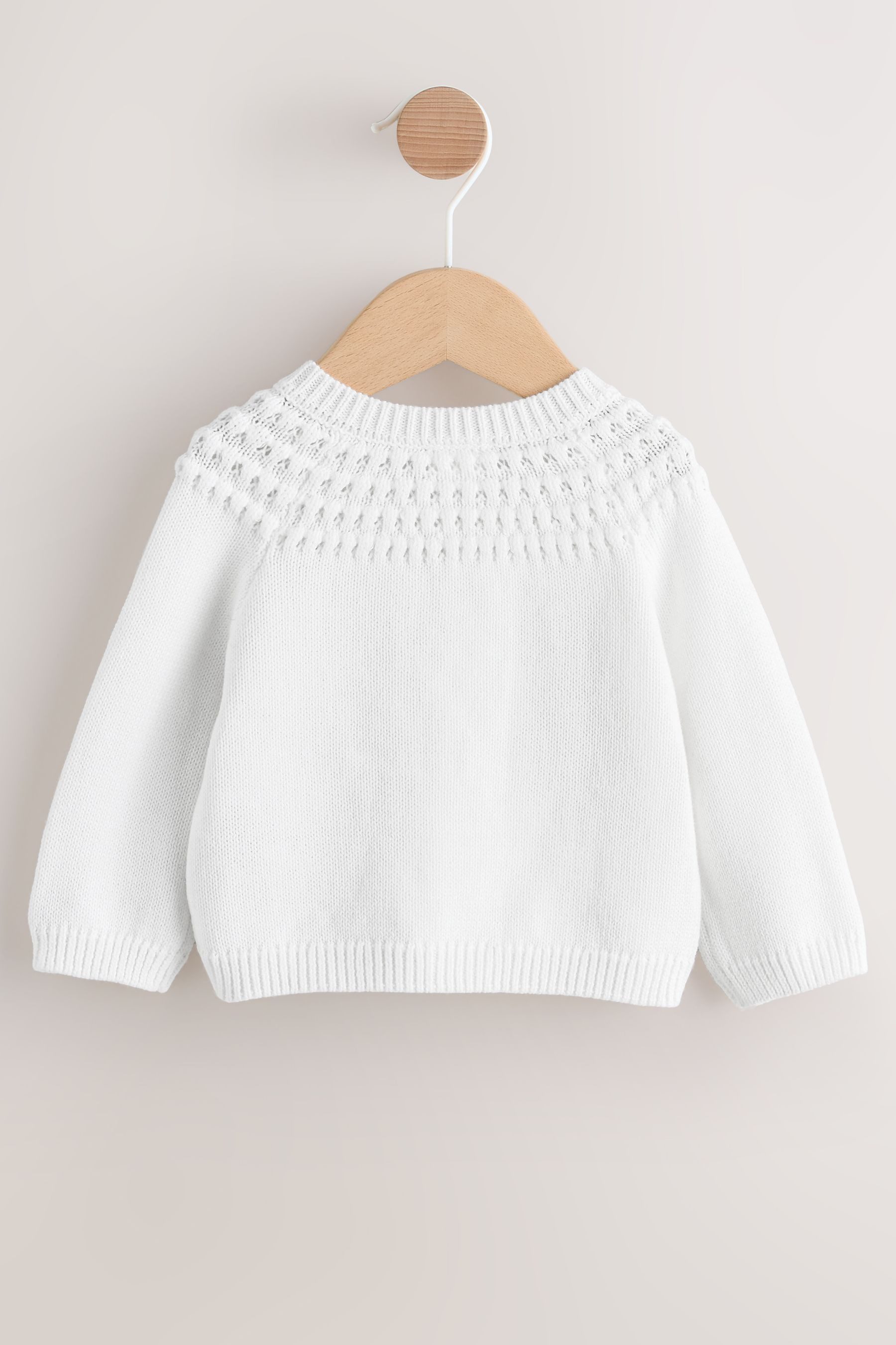 Next Strickjacke Baby Strickjacke mit Knopfleiste, Tasche und Herz (1-tlg)