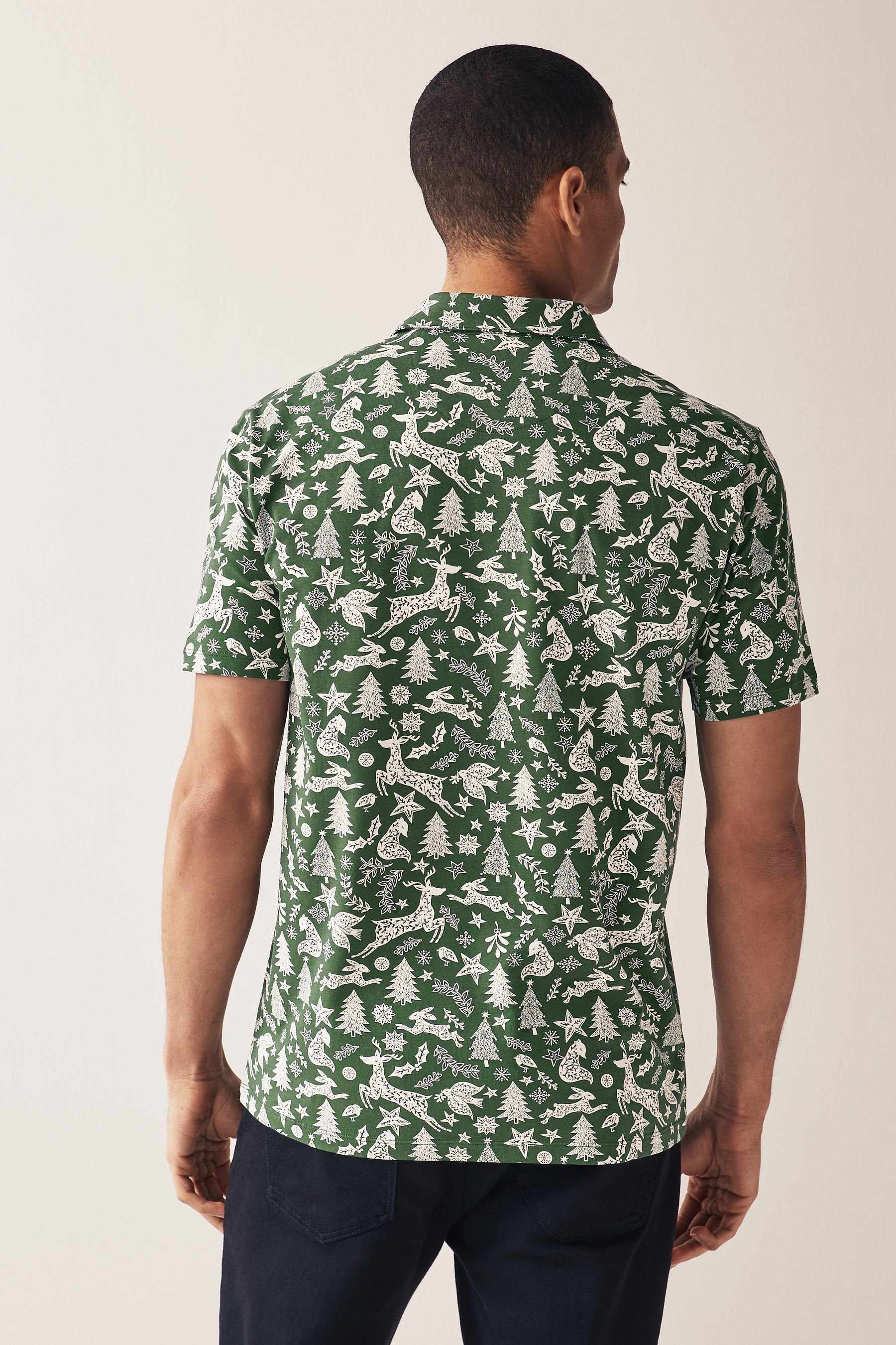 in (1-tlg) Print Next weihnachtlichem Polo-Shirt Green Tree Poloshirt