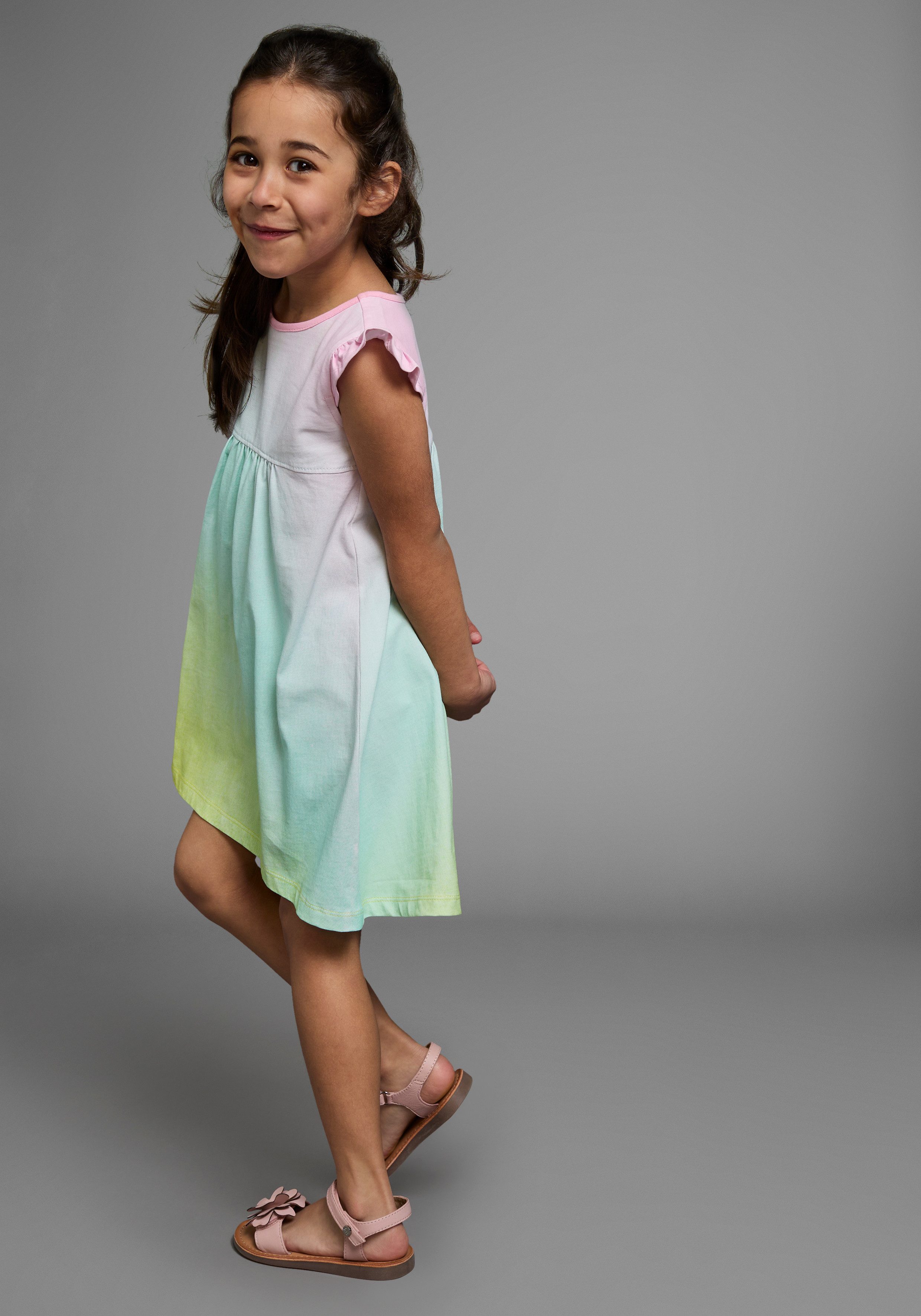 KIDSWORLD Jerseykleid in Regenbogenfarben kniefreie Länge, weit ausgestellter Schnitt, aus Baumwolle