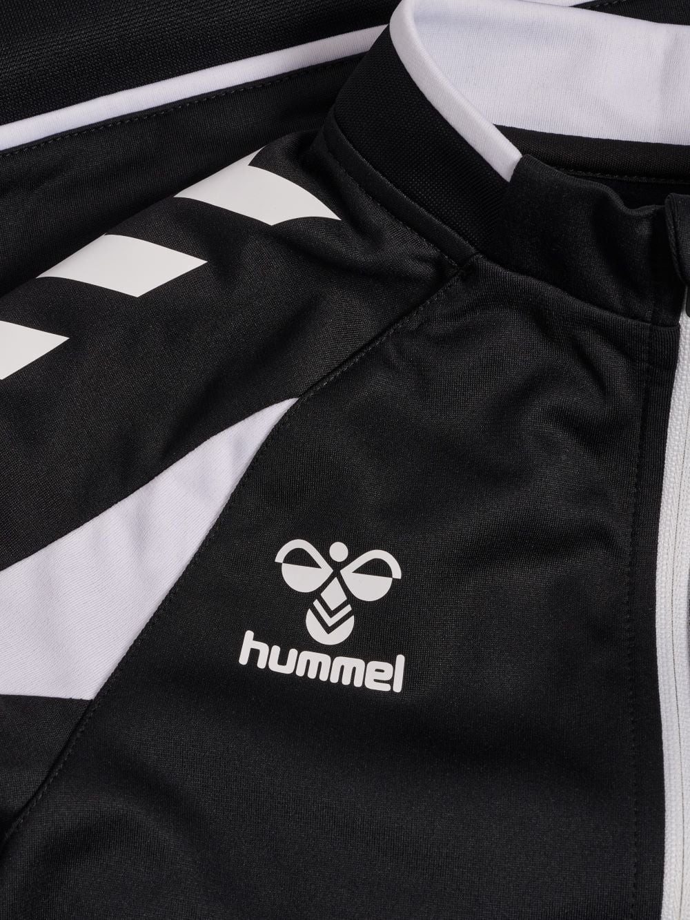 hummel Trainingsjacke hmlCORE 2.0 Track Zip (100% rec. Polyester) schwarz/weiss Jungen