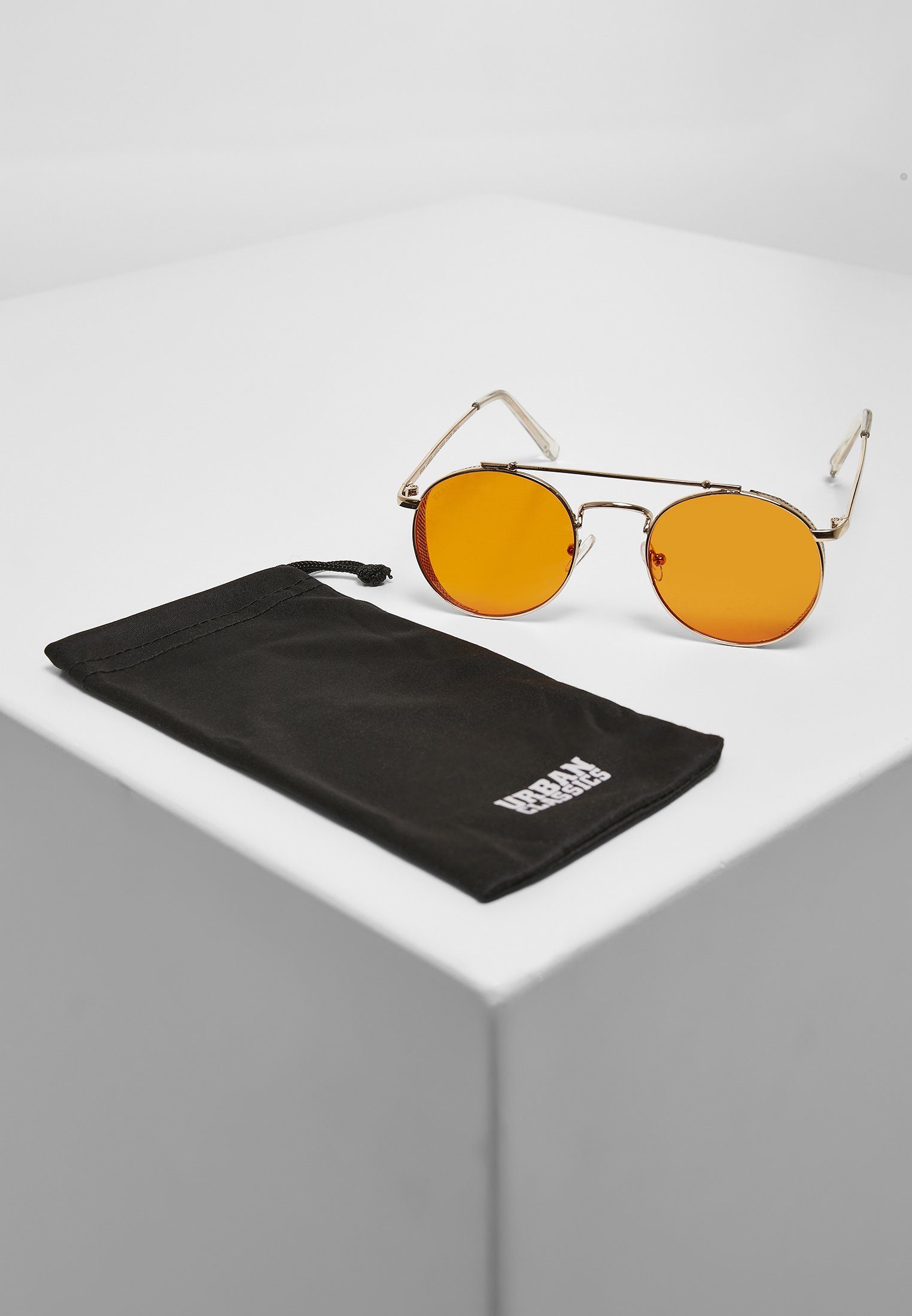 URBAN CLASSICS Sonnenbrille Unisex Sunglasses Chios gold/orange | Sonnenbrillen