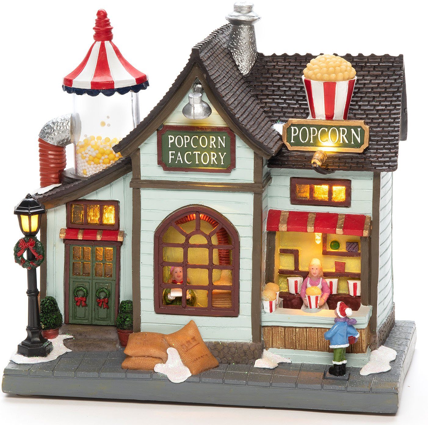KONSTSMIDE Weihnachtshaus Weihnachtsdeko, LED Szenerie Popcornfabrik, mit Animation, 8 Weihnachtsliedern