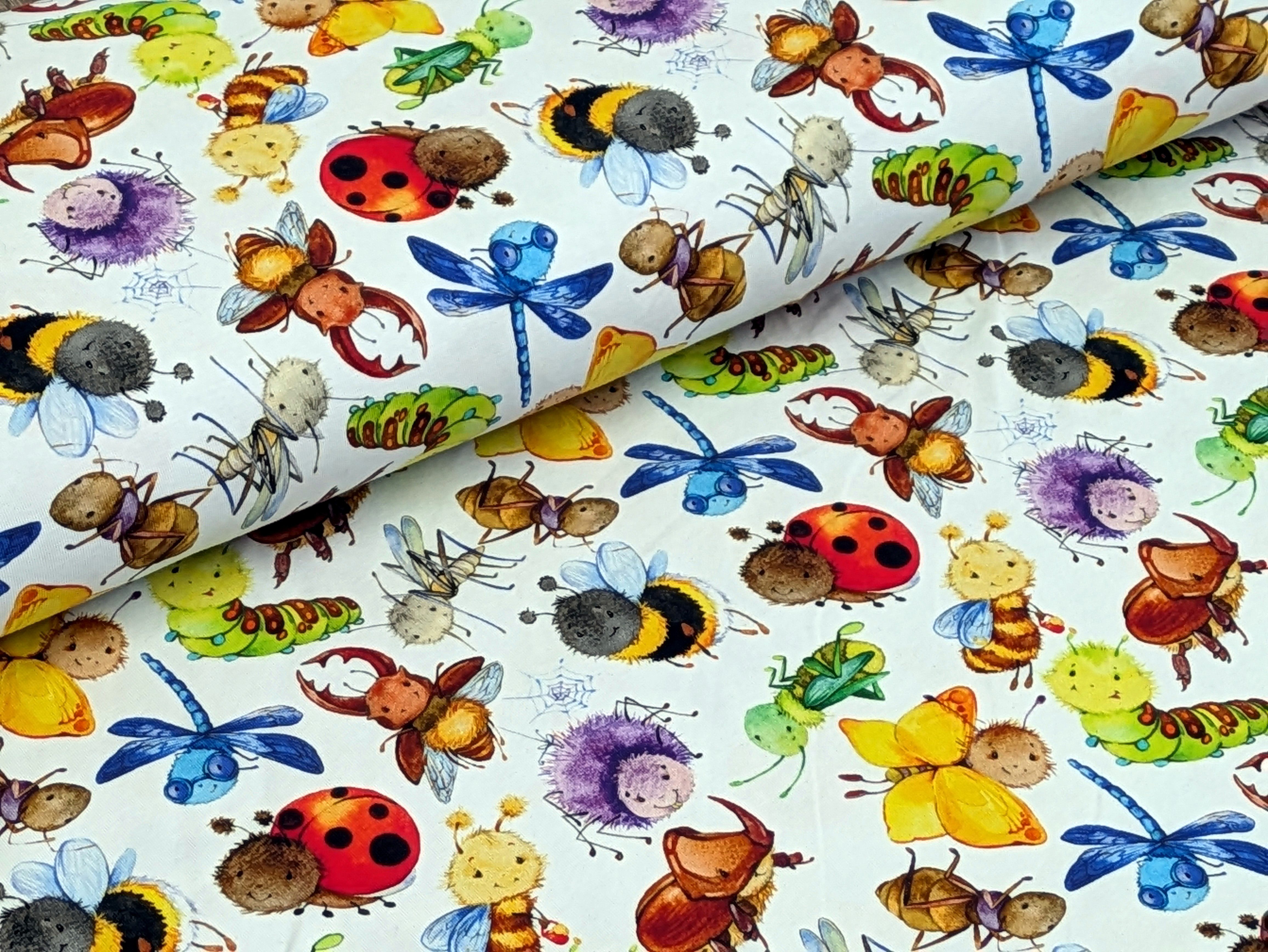 Corileo Stoff Eigenproduktion Baumwolljersey Insekten Käfer Wiese Weiß Stoff