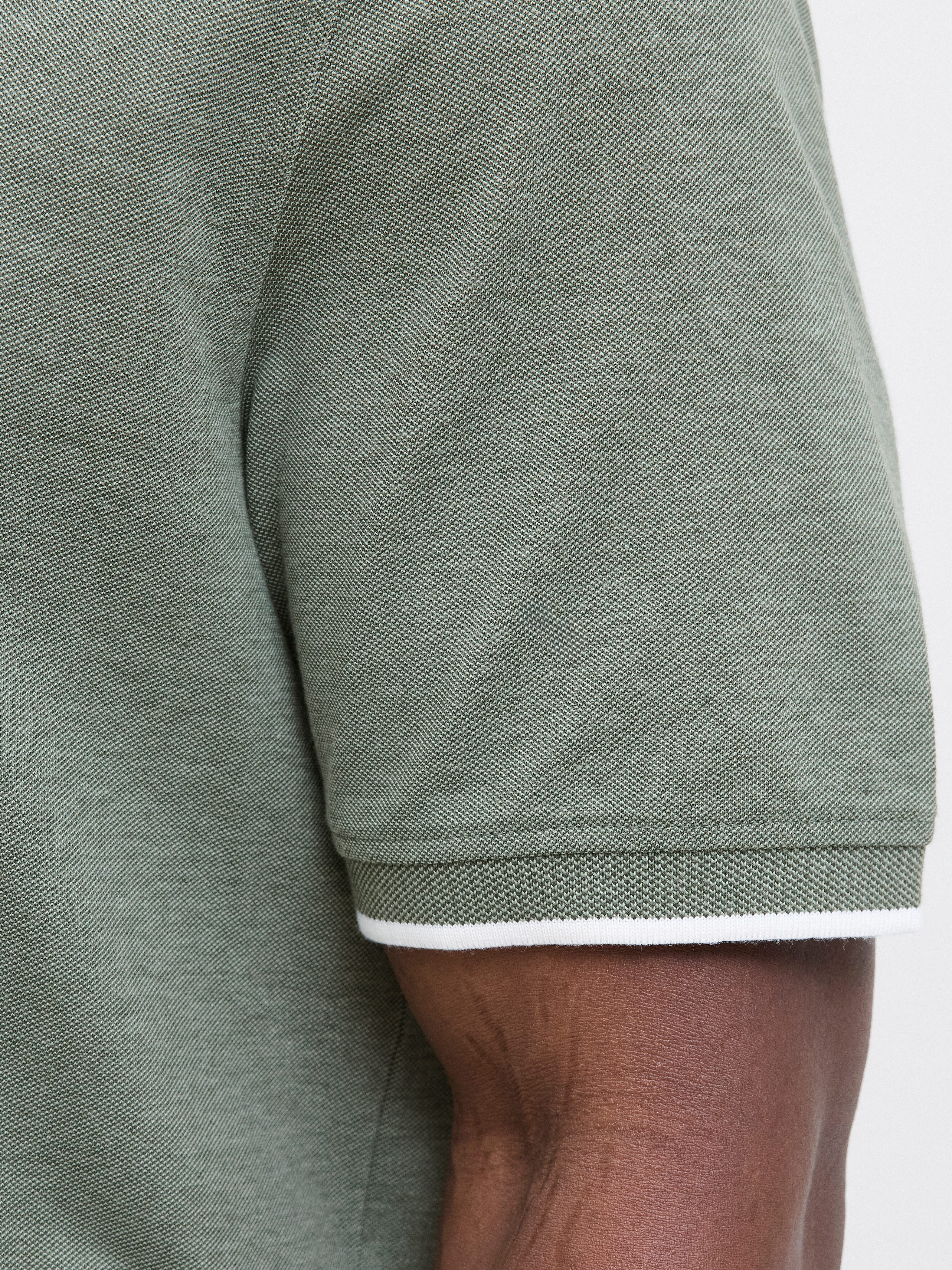 Jack & Jones PlusSize Poloshirt JJEPAULOS POLO SS NOOS PLS mit Logo Sticker günstig online kaufen