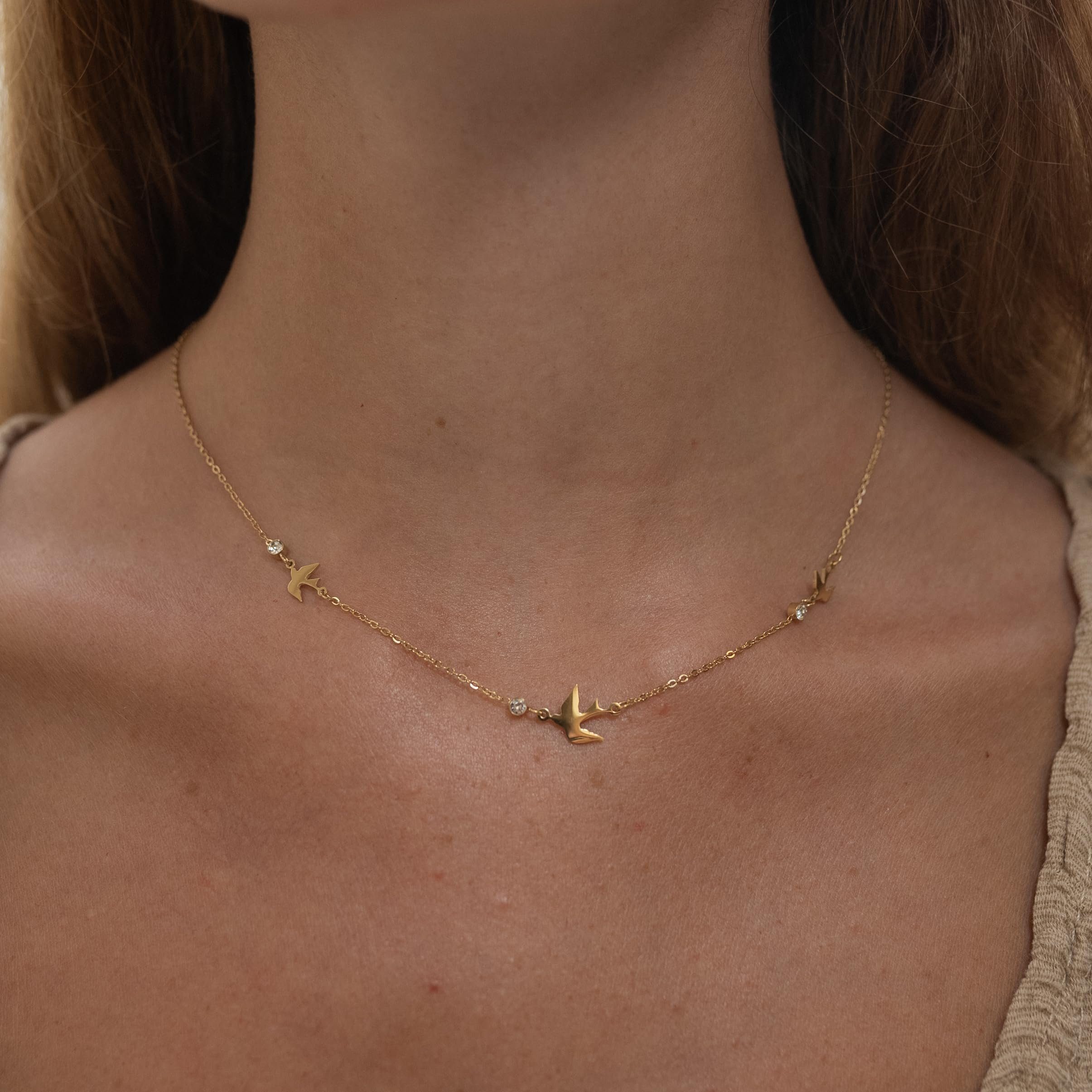 Made by Nami Edelstahlkette Halskette Damen Gold mit Vögeln und Kristall Ed günstig online kaufen