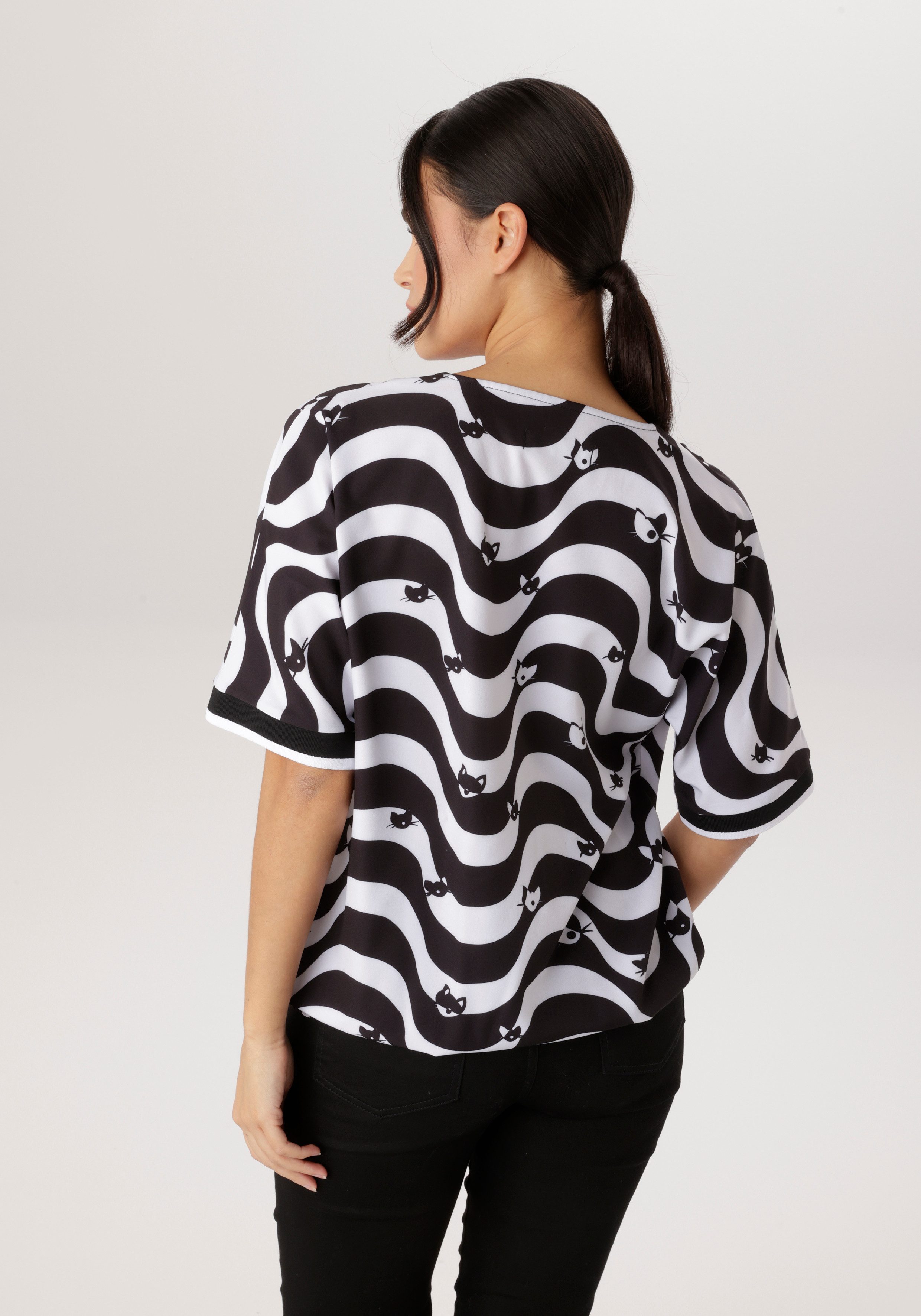 Aniston SELECTED Schlupfbluse mit Gummizug am Saum und grafischen Muster - NEUE KOLLEKTION