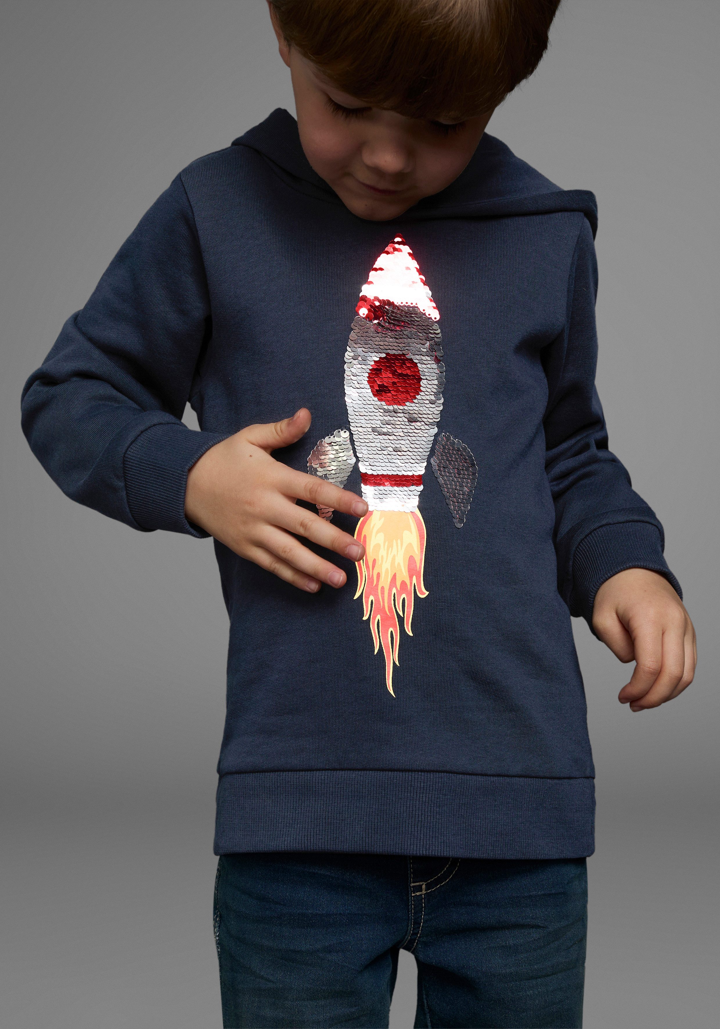 KIDSWORLD Kapuzensweatshirt Rakete - Wendepaillette lange Ärmel, Basic-Passform, aus Baumwolle, mit Rippbündchen