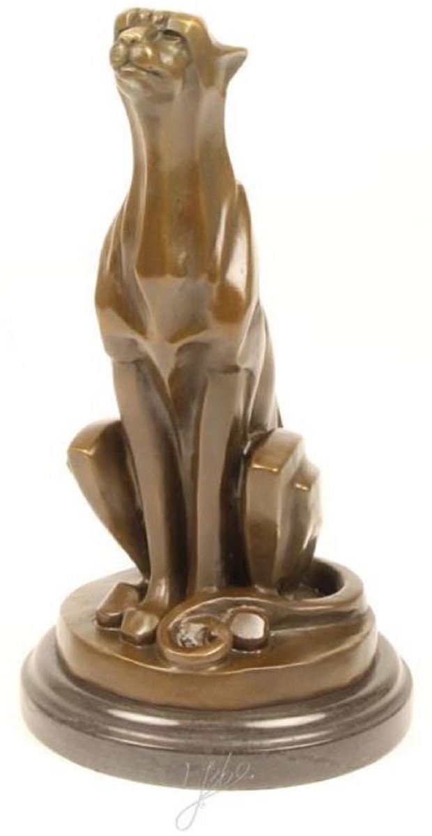 Casa Padrino Dekofigur Art Deco Bronze Skulptur mit Marmorsockel sitzender Gepard Bronze / Gold / Schwarz 15,8 x 16,7 x H. 29,7 cm - Bronzefigur - Tierfigur - Deko Accessoires