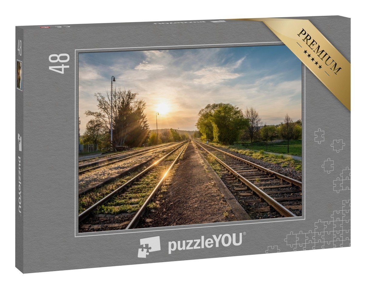 puzzleYOU Puzzle Frühlings-Sonnenuntergang auf Bahngleisen, 48 Puzzleteile,  puzzleYOU-Kollektionen Eisenbahn
