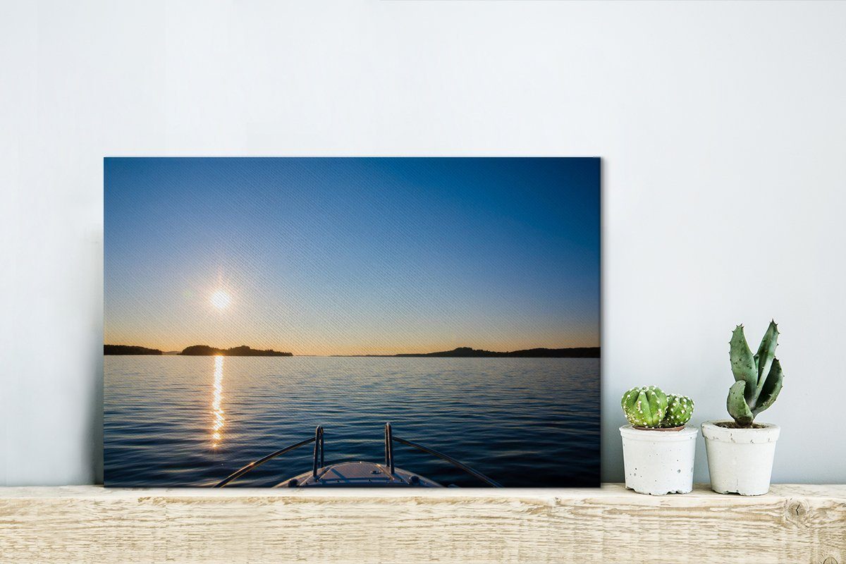 von einem Wanddeko, Leinwandbilder, Leinwandbild (1 Sonnenuntergang 30x20 St), cm OneMillionCanvasses® Wandbild Ein Aufhängefertig, Motorboot aus,