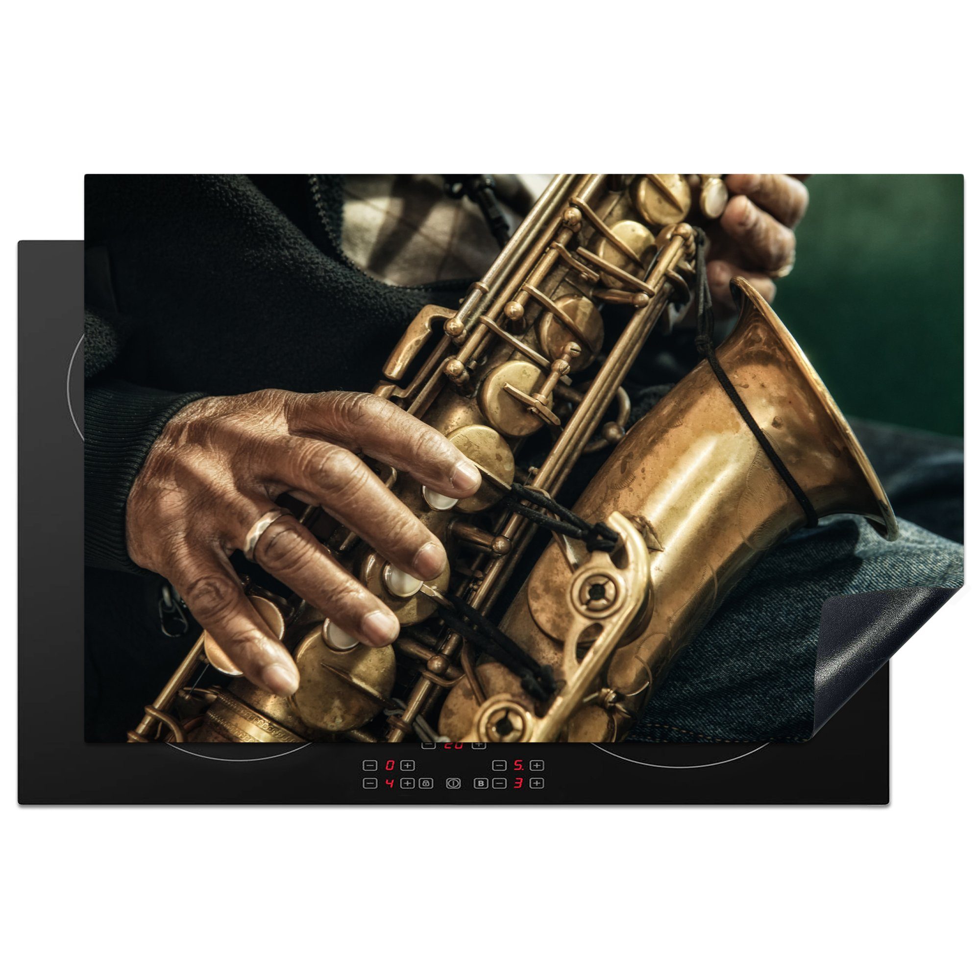 Schutz küche, die (1 Herdblende-/Abdeckplatte Vinyl, Ceranfeldabdeckung MuchoWow tlg), eines cm, Saxophon spielenden Mannes, für 81x52 Nahaufnahme Induktionskochfeld