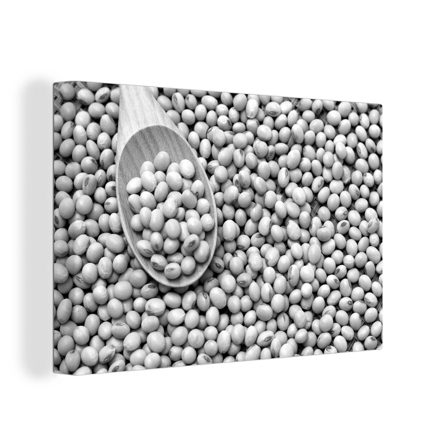OneMillionCanvasses® Leinwandbild Bild von Sojabohnen und einem Holzlöffel gefüllt mit Sojabohnen -, (1 St), Wandbild Leinwandbilder, Aufhängefertig, Wanddeko, 30x20 cm
