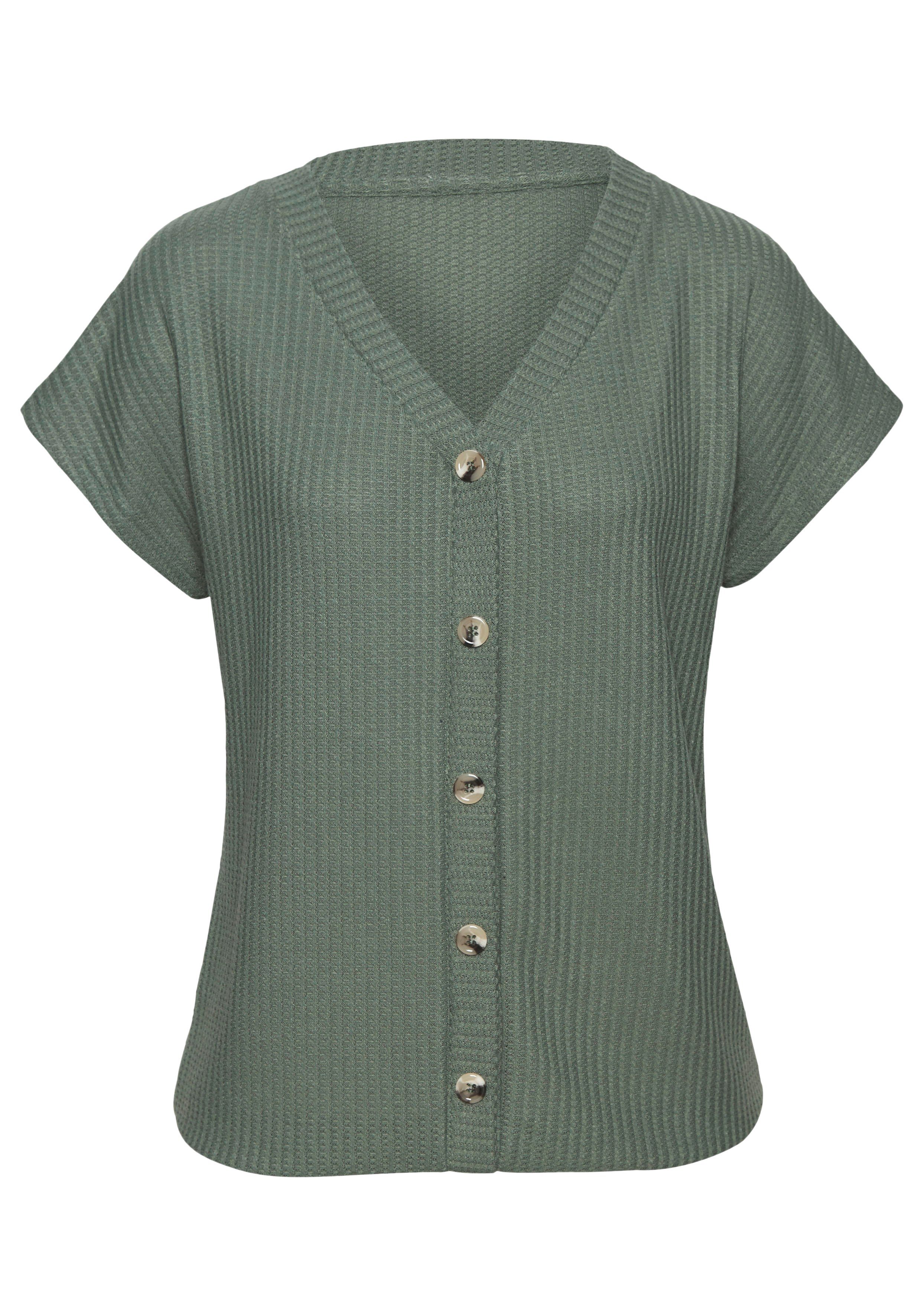 LASCANA Kurzarmshirt mit Zierknopfleiste aus weicher Piqué-Qualität. € 29,99, (€ 29,99 pro 1 Stk).