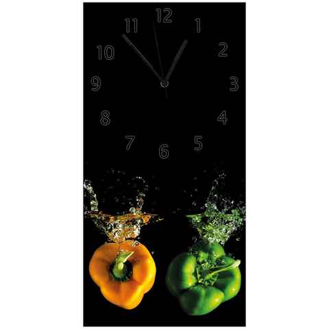 Wallario Wanduhr Bunte Küche Paprika in orange und grün im Wasser (Uhr aus Acryl)