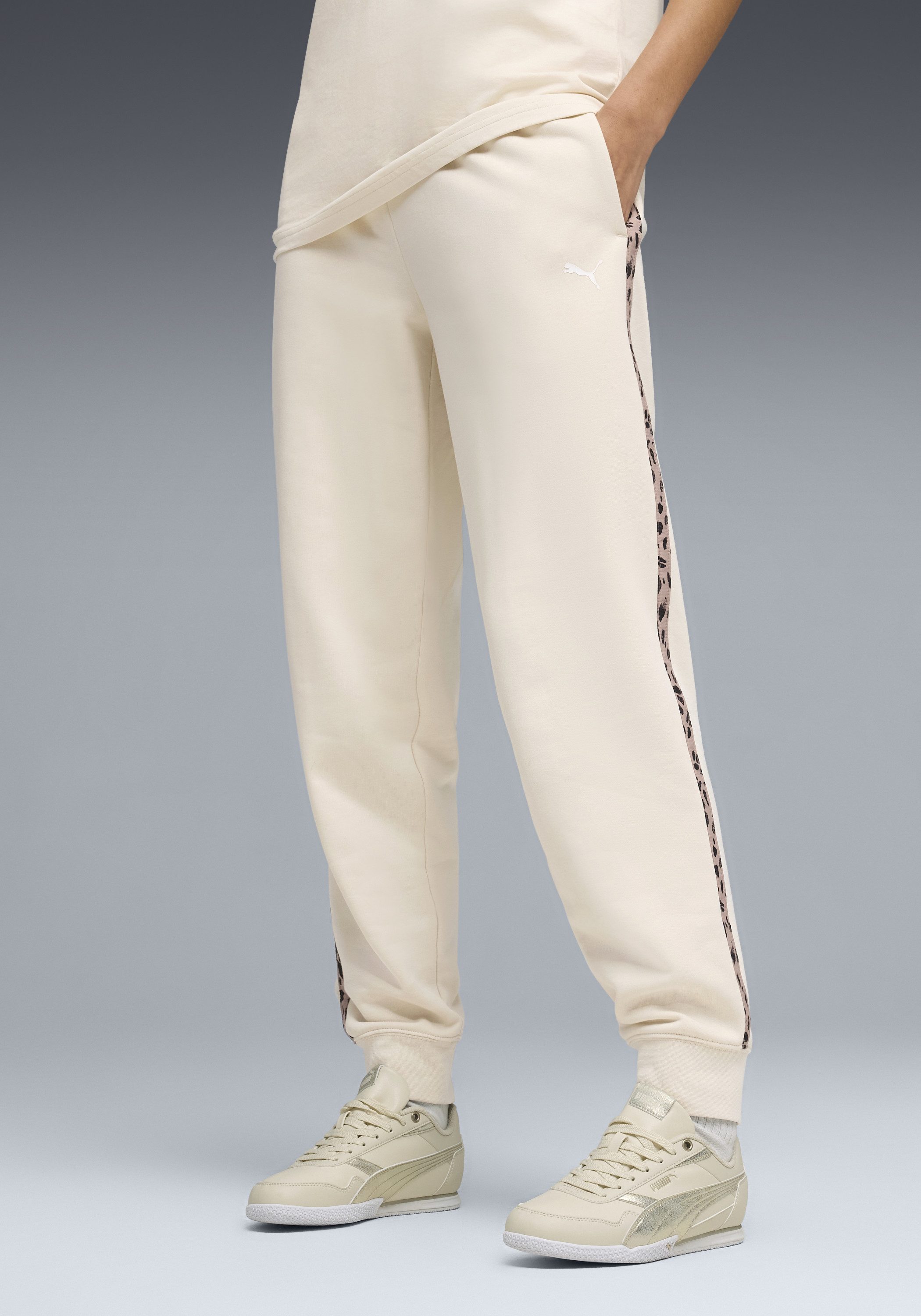 PUMA Trainingshose ESS GRAPHIC ANIMAL COMFORT PANTS TR CL mit Eingrifftaschen, sportlicher Stil, mit modernem Print