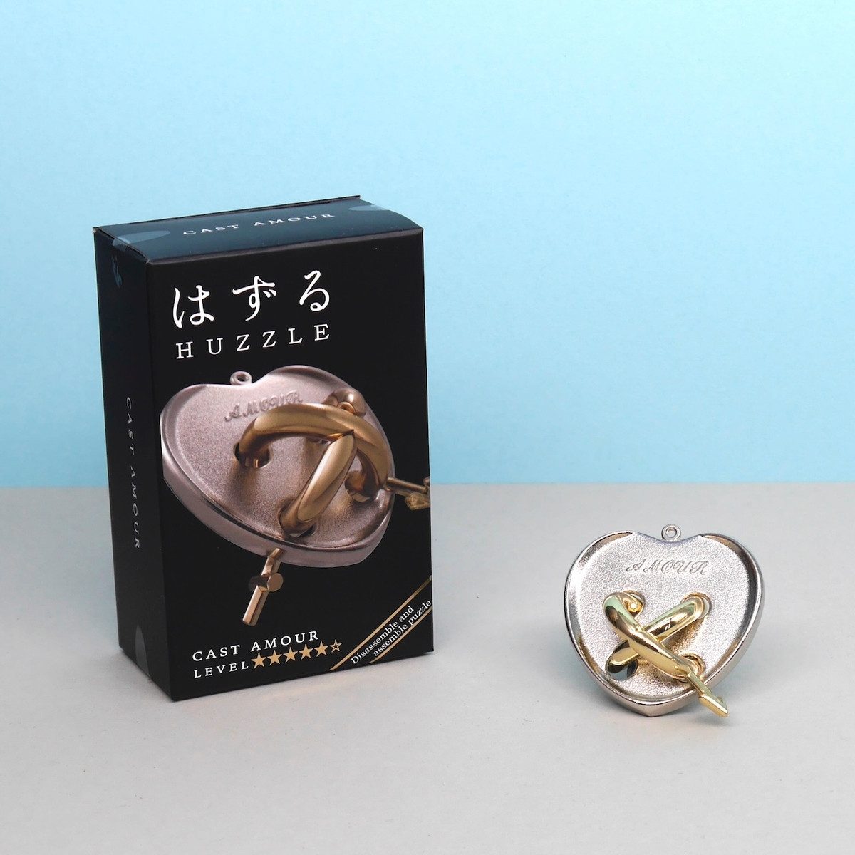 Hanayama Spiel HUZZLE CAST AMOUR - inniges Liebespuzzle, Knobelspiel, Metallpuzzle