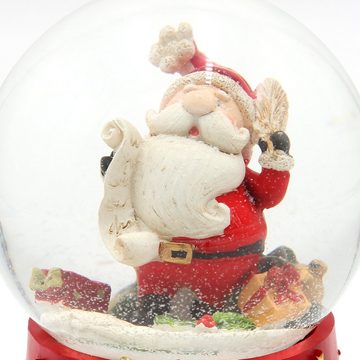 Dekohelden24 Schneekugel Große Schneekugel, Weihnachtsmann mit Feder und Wunschzettel, mit (1 St)