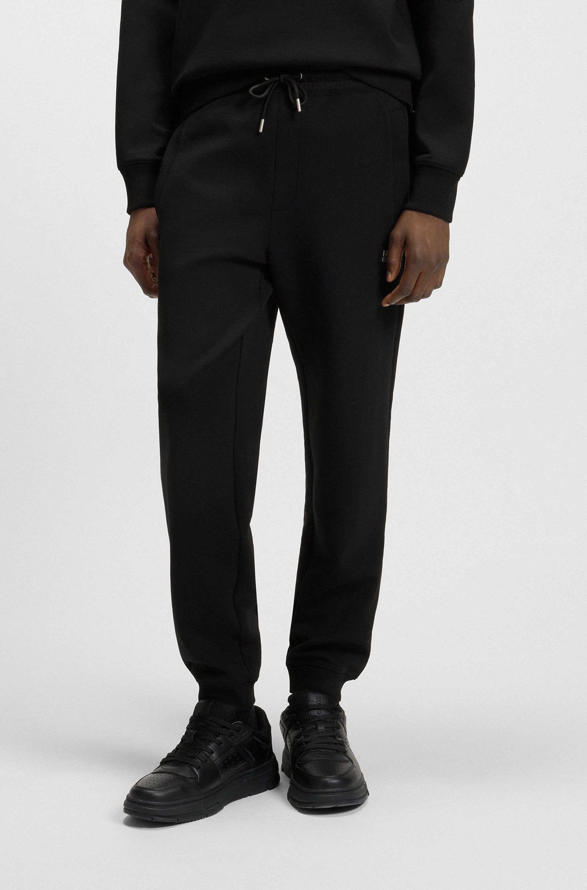 HUGO Sweathose Dimacs Metal Logo elastischer Bund mit Kordel, Relaxed Fit, Premium Interlock