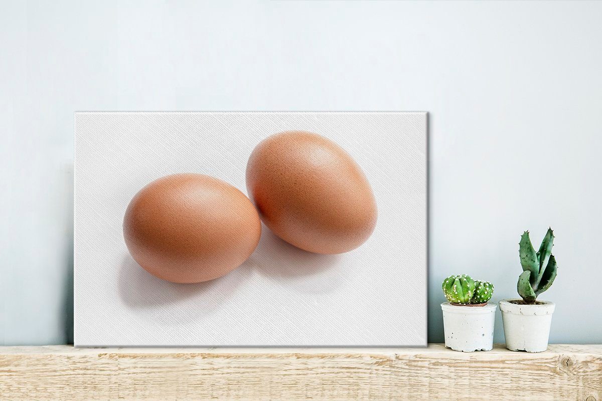 OneMillionCanvasses® Leinwandbild Rote Eier auf Leinwandbilder, 30x20 cm Aufhängefertig, Hintergrund, Wandbild St), (1 Wanddeko, weißem