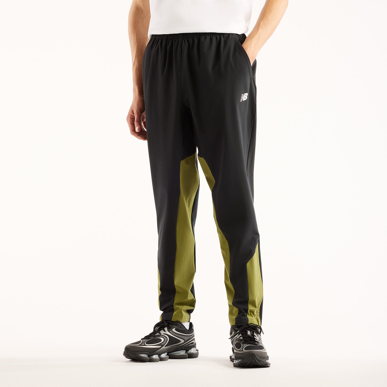 New Balance Trainingshose UTILITY STRETCH WOVEN PANT Trainingshose für Fitness und Sportmode, sportlicher Stil
