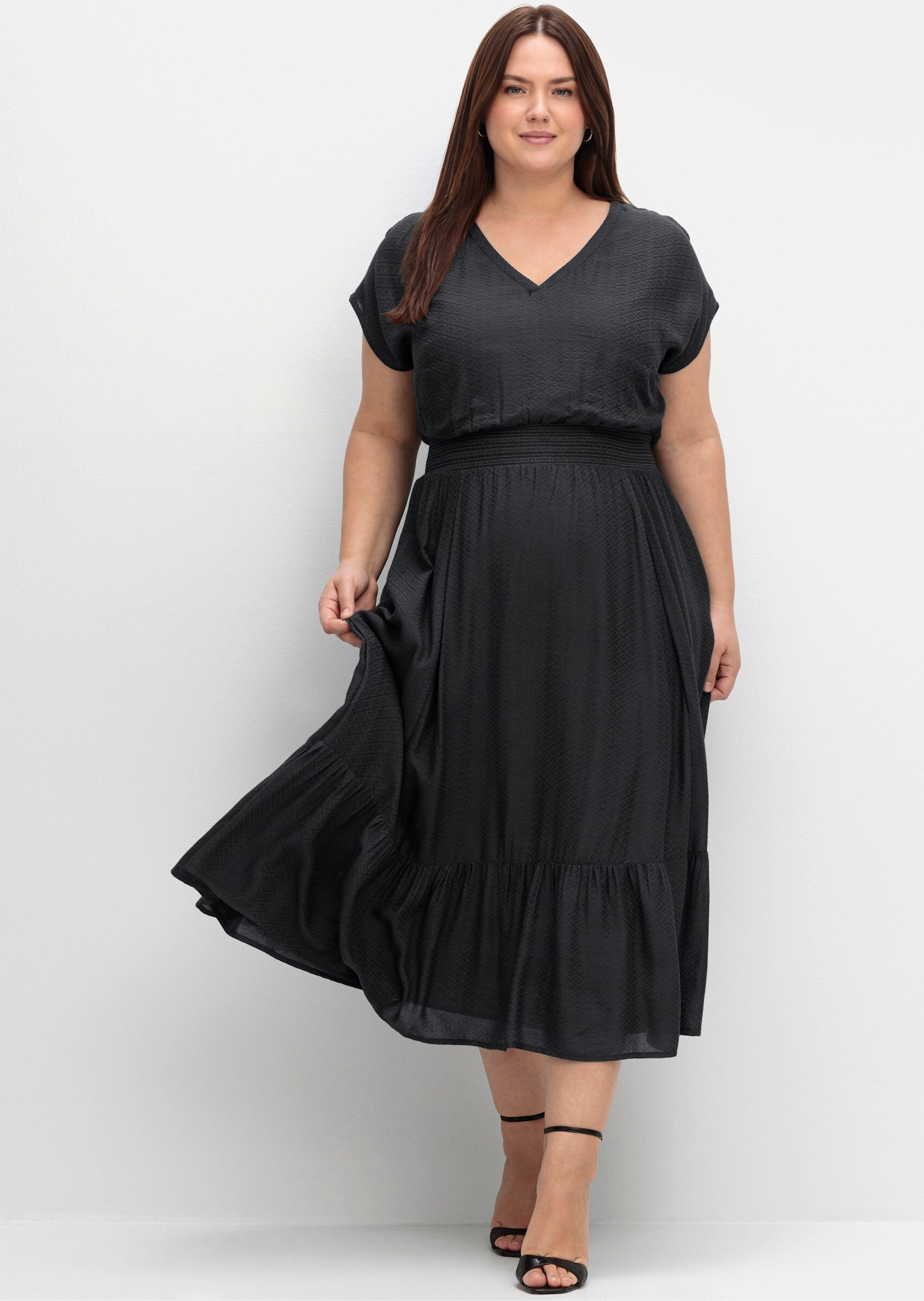 Sheego Etuikleid Maxikleid Kurzarm mit Smokbund und Volant am Saum