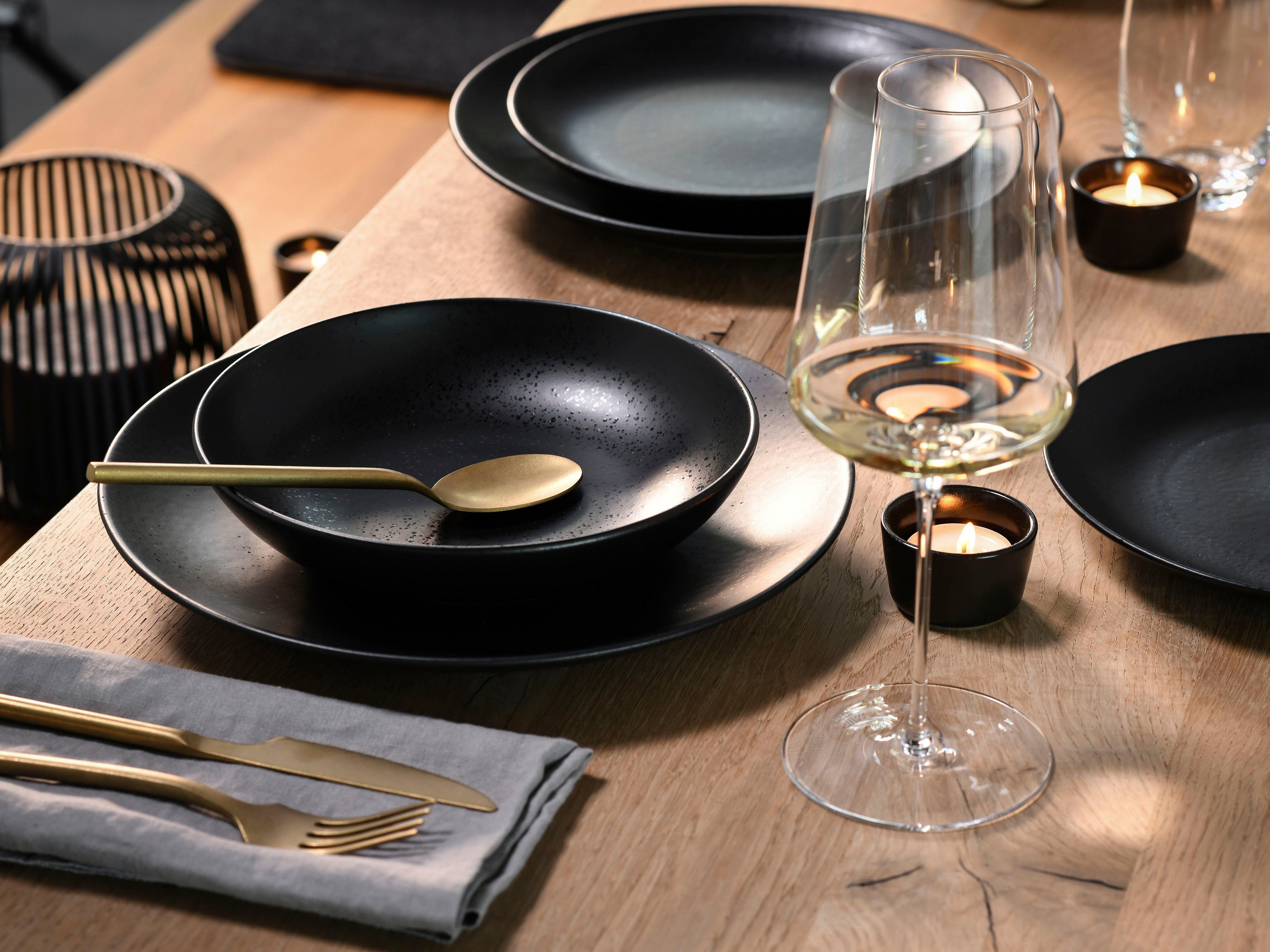 CreaTable Tafelservice Magic Black Coupe (12-tlg), 4 Personen, Steinzeug, Teller Set, matte Spezialglasur mit glänzenden Sprenkeln