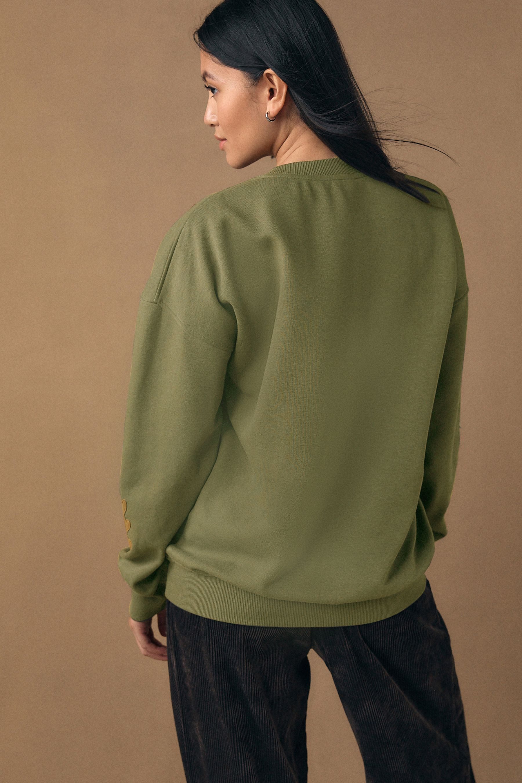 Next Sweater Sweatshirt mit Applikation (1-tlg) günstig online kaufen