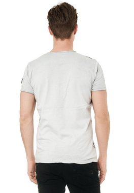 Rusty Neal T-Shirt mit seitlichem Print