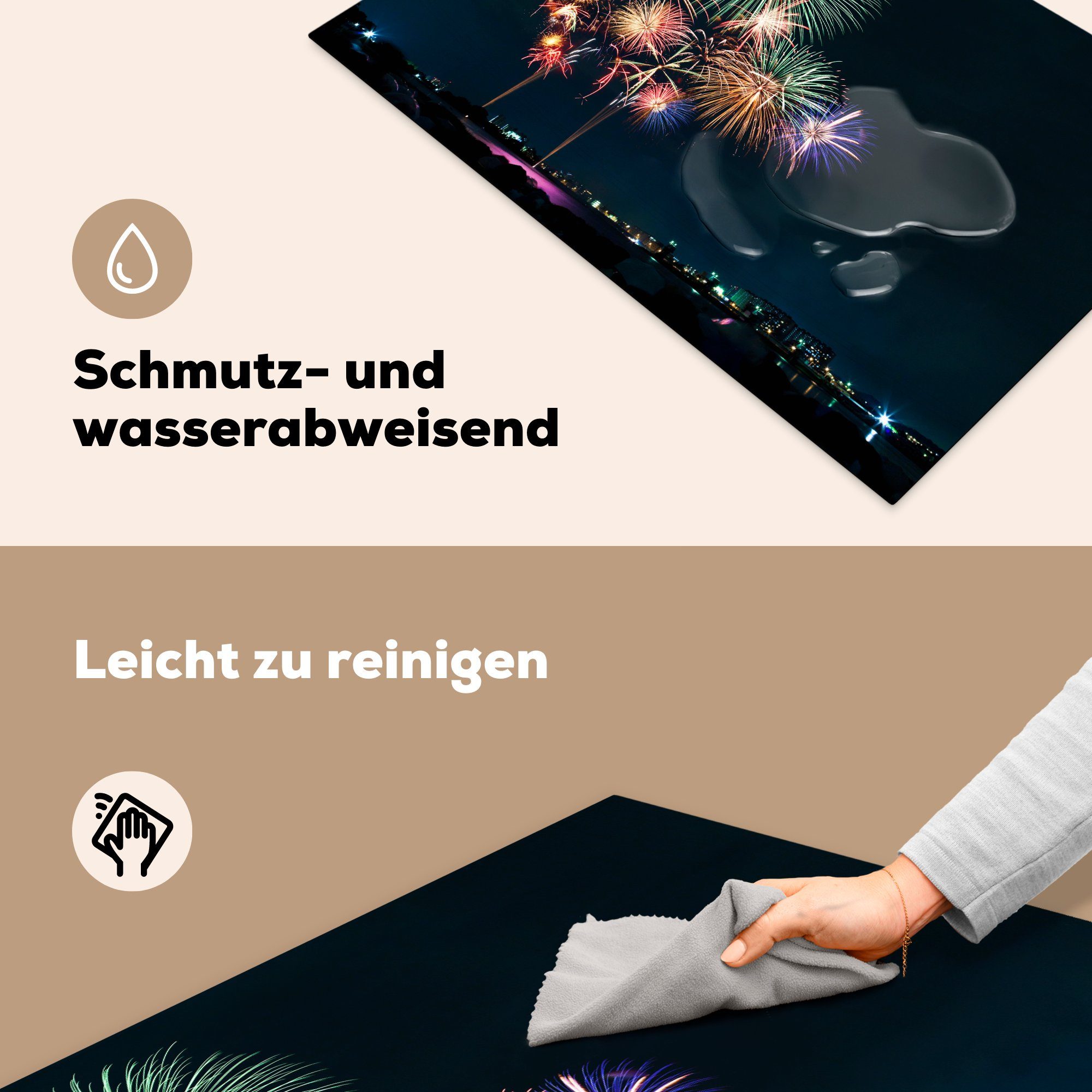 einer Ceranfeldabdeckung küche, Bild Stadt Schutz in cm, (1 vom Feuerwerk für Herdblende-/Abdeckplatte 81x52 MuchoWow Ein während die Silvesternacht, Vinyl, Induktionskochfeld der tlg),