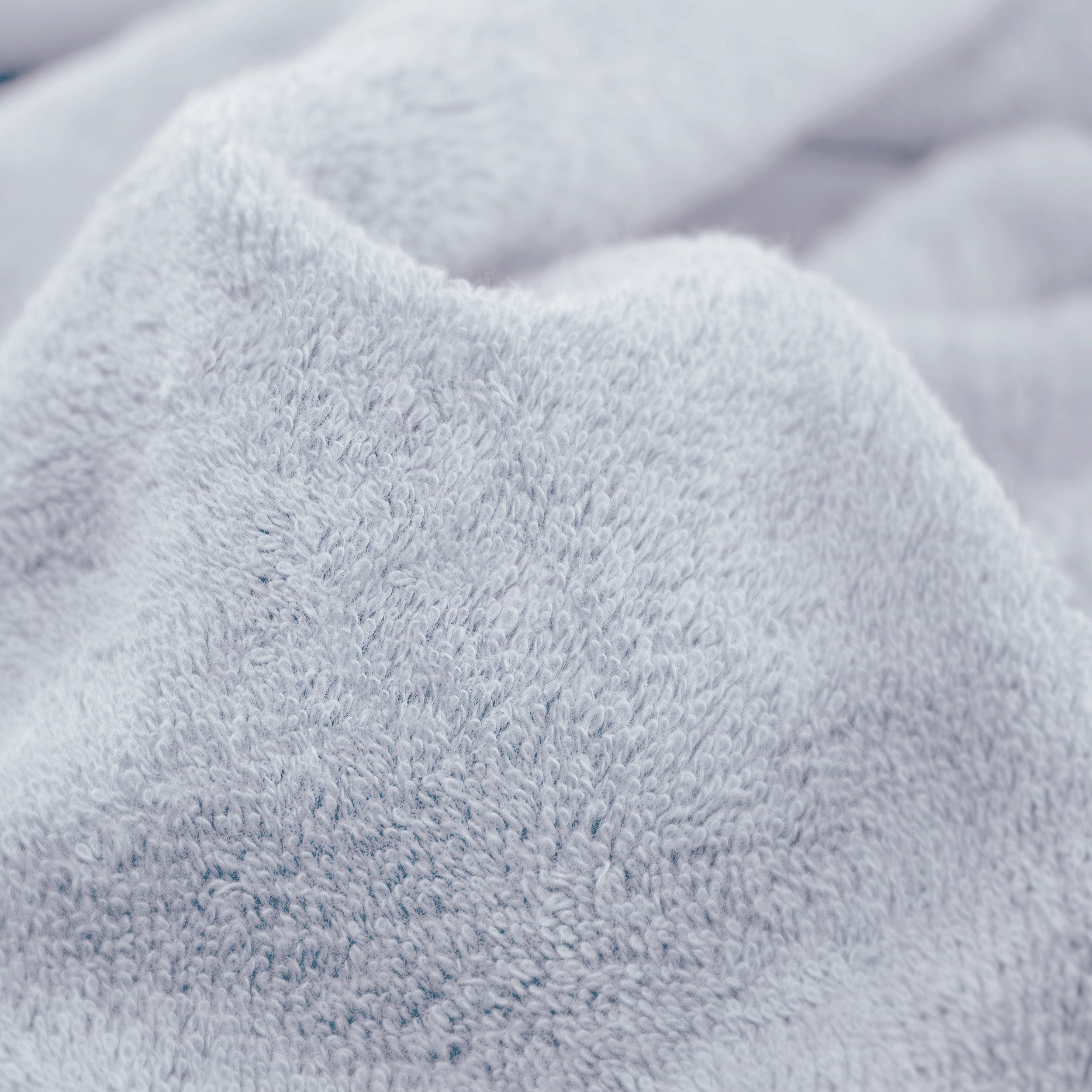 Möve Waschhandschuh Superwuschel 100% Premium Cotton Baumwolle, Walkfrottier (1-St), mit Biesenbordüre und praktischem Kordelaufhänger, einfarbig, weich