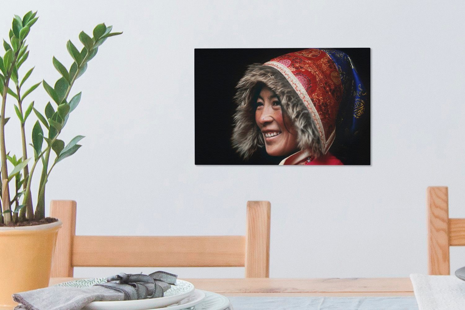 Leinwandbild in Wanddeko, St), Kleidung 30x20 tibetische (1 trägt Tibet, Person Wandbild Aufhängefertig, OneMillionCanvasses® cm traditionelle Eine Leinwandbilder,