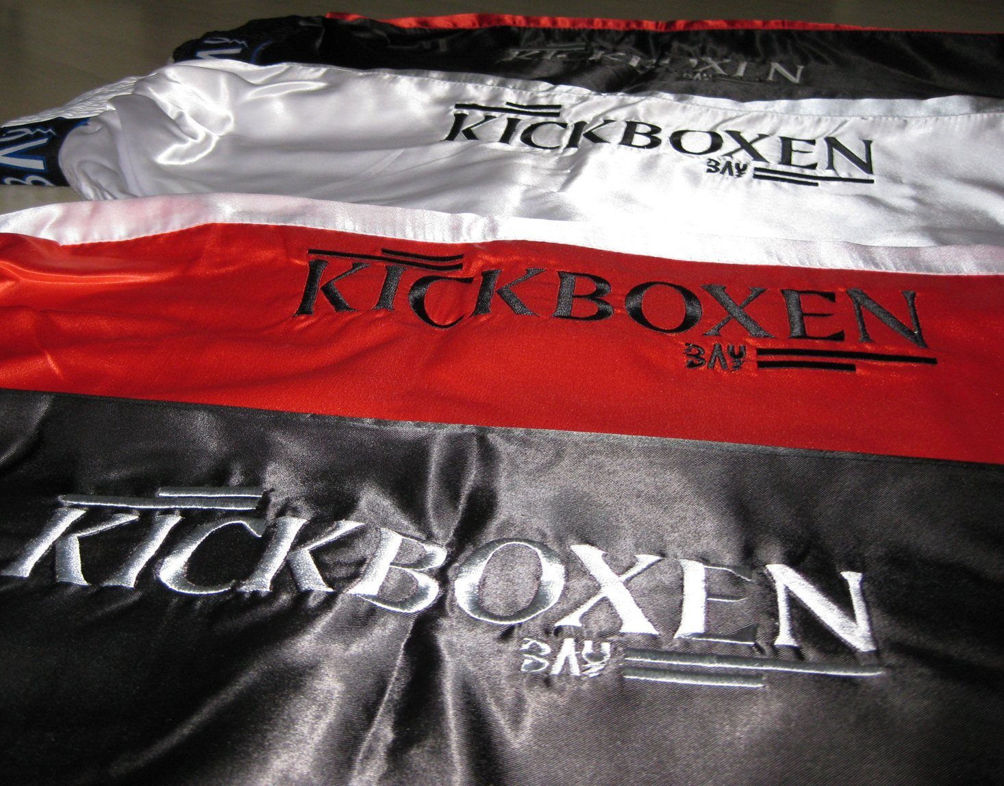 Stick uni Kickboxhose und Short Kampfsport Hose Kinder Erwachsene Kickboxen Kampfsporthose (1-tlg) schwarz BAY-Sports Sporthose