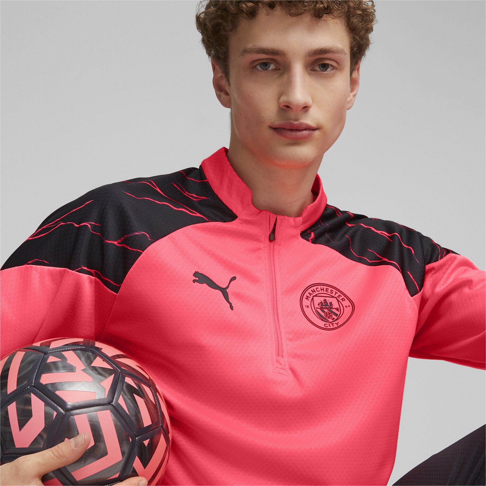 PUMA Trainingsshirt Manchester City Fußball-Trainings-Top Black mit Viertelreißverschluss Sunset Navy Pink Dark Glow