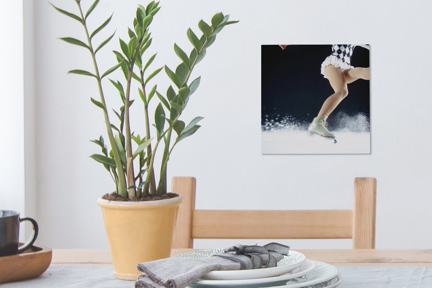 OneMillionCanvasses® Leinwandbild Eine weißen auf einem Bilder bremst Schlafzimmer (1 Leinwand St), Wohnzimmer Eiskunstläuferin für Schlittschuh
