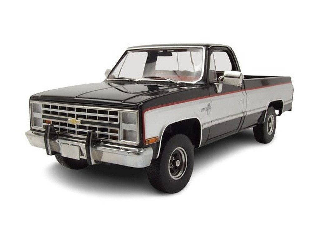 GREENLIGHT collectibles Modellauto Chevrolet K10 Silverado Pick Up 1986 schwarz grau metallic, Maßstab 1:18