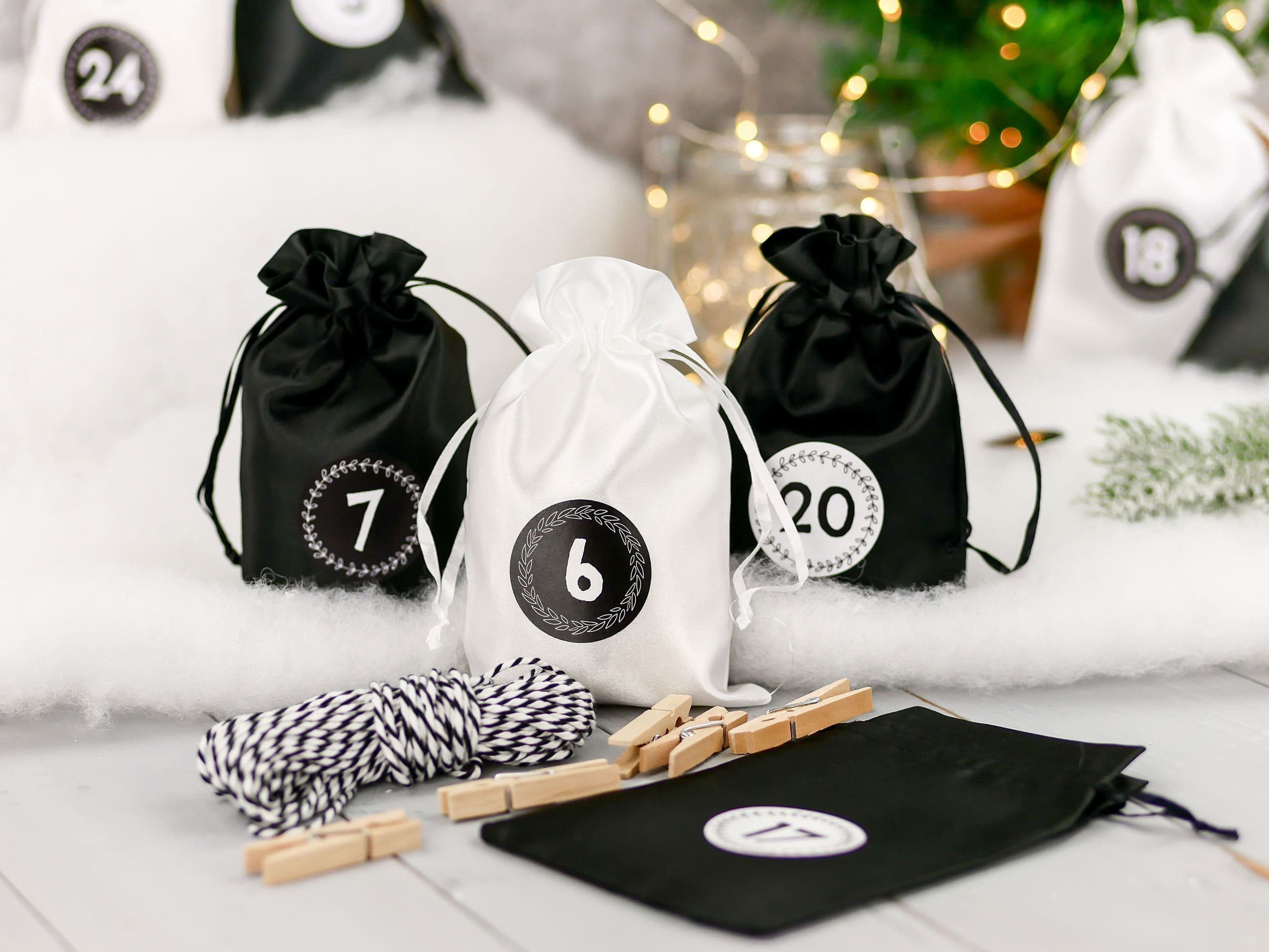 PAPIERDRACHEN befüllbarer Adventskalender Papierdrachen 24 Adventskalender Stoffsäckchen zum Befüllen, inkl. Bäckergarn, Holzklammern und 24 Zahlenaufklebern