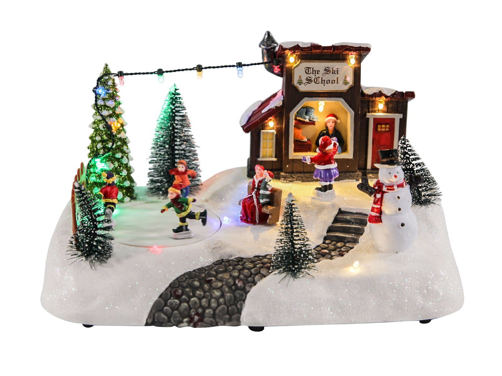 Spetebo Weihnachtsszene Eisbahn mit fahrenden Figuren - THE SKI SCHOOL