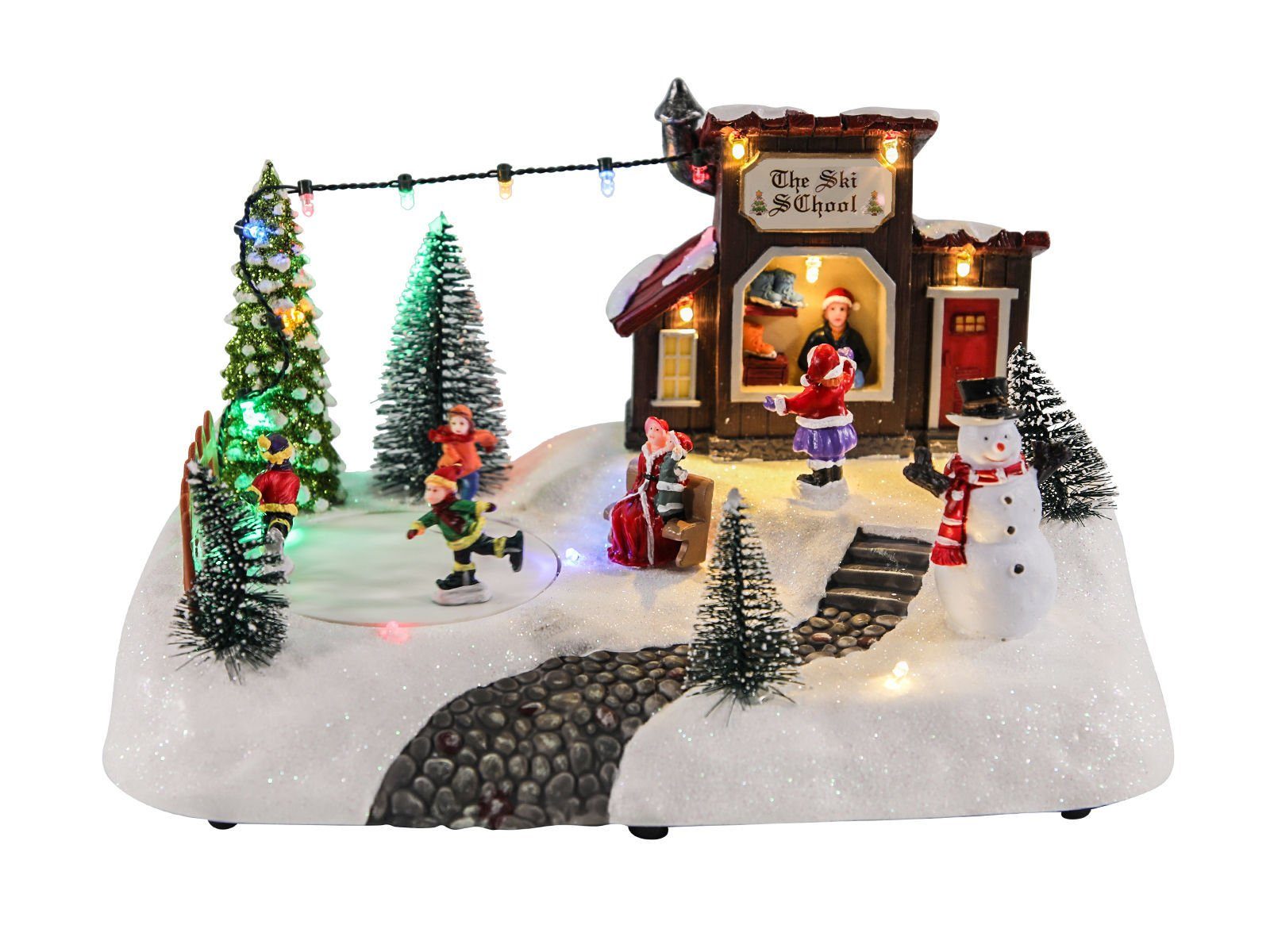 Weihnachtsszene Eisbahn mit fahrenden Figuren - THE SKI SCHOOL