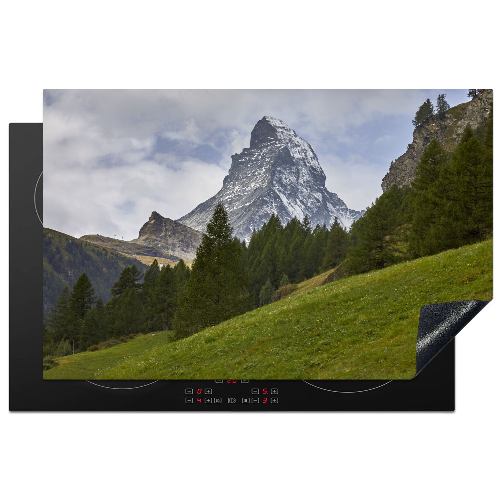MuchoWow Herdblende-/Abdeckplatte Das Schweizer Matterhorn hinter einem Tannenwald, Vinyl, (1 tlg), 81x52 cm, Induktionskochfeld Schutz für die küche, Ceranfeldabdeckung