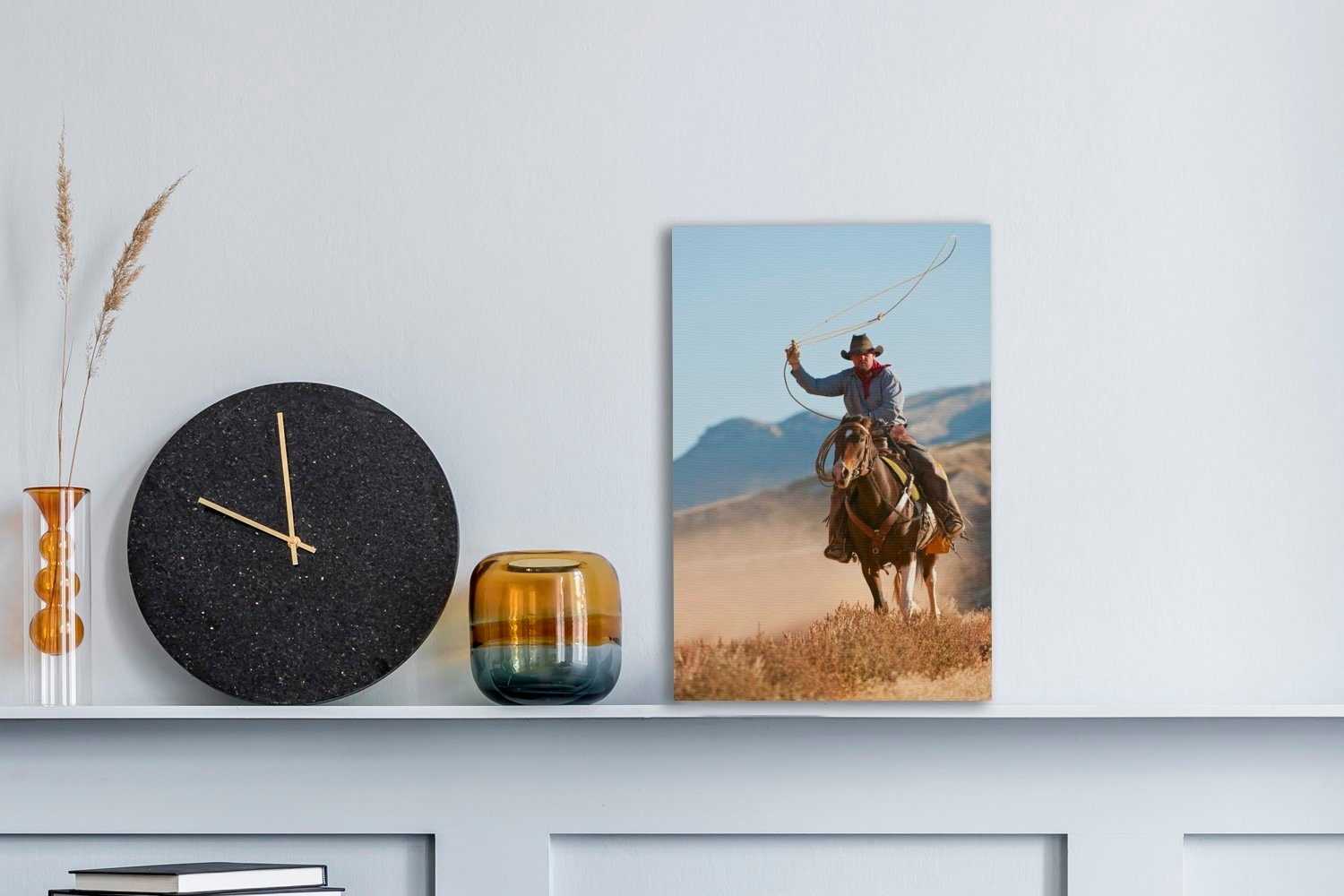 OneMillionCanvasses® Leinwandbild Ein Cowboy mit fertig (1 bespannt St), Zackenaufhänger, inkl. Leinwandbild Lasso, 20x30 cm einem Gemälde