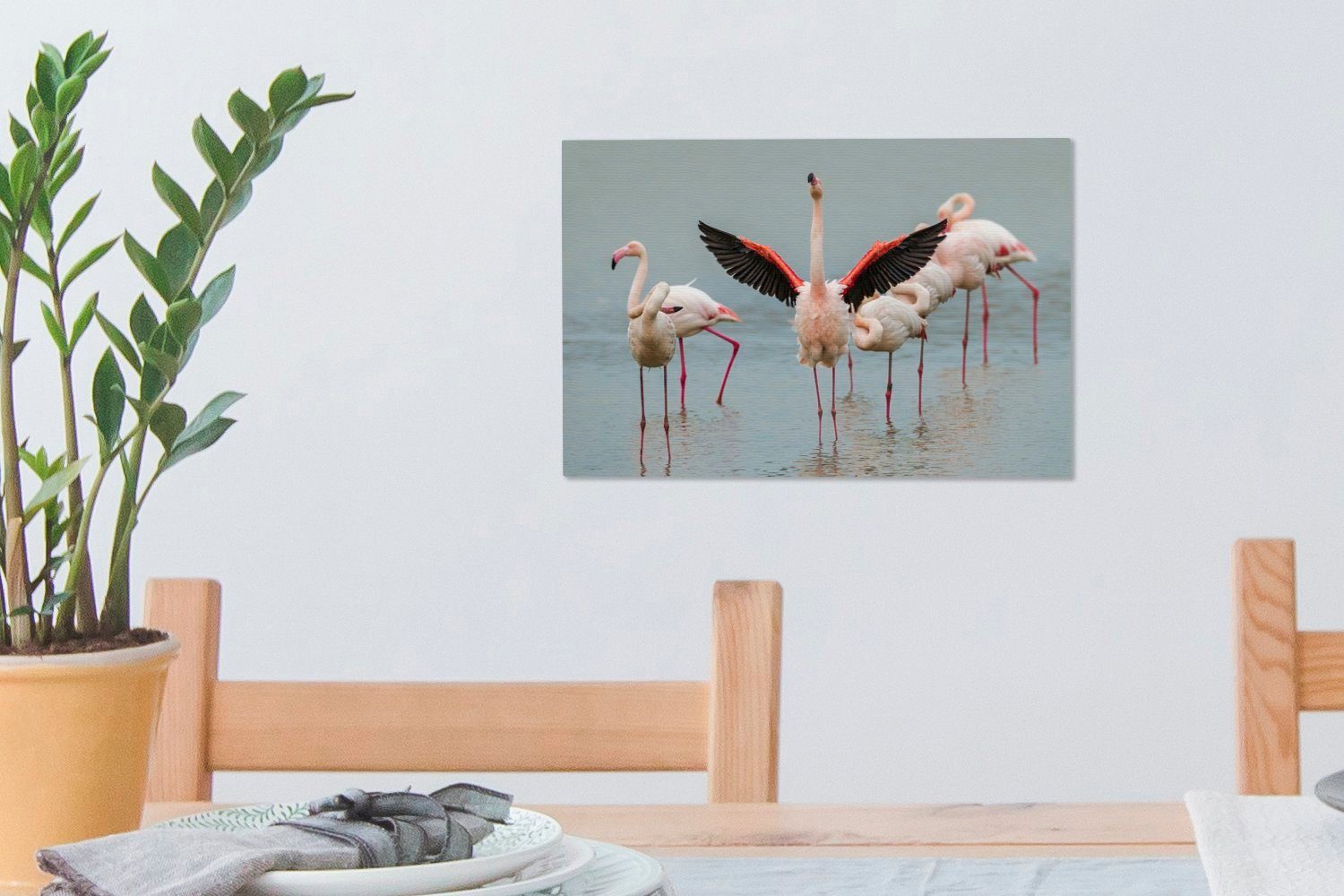 OneMillionCanvasses® Leinwandbild Ein Aufhängefertig, der Flamingo, ausstreckt, Wandbild sich (1 cm Wanddeko, Leinwandbilder, St), 30x20