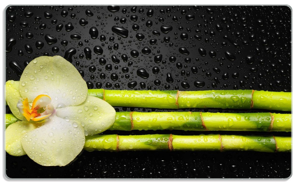 Wallario Frühstücksbrett Grüne Orchidee mit Bambus auf schwarz - Regentropfen, ESG-Sicherheitsglas, (inkl. rutschfester Gummifüße 4mm, 1-St), 14x23cm | Frühstücksbrettchen