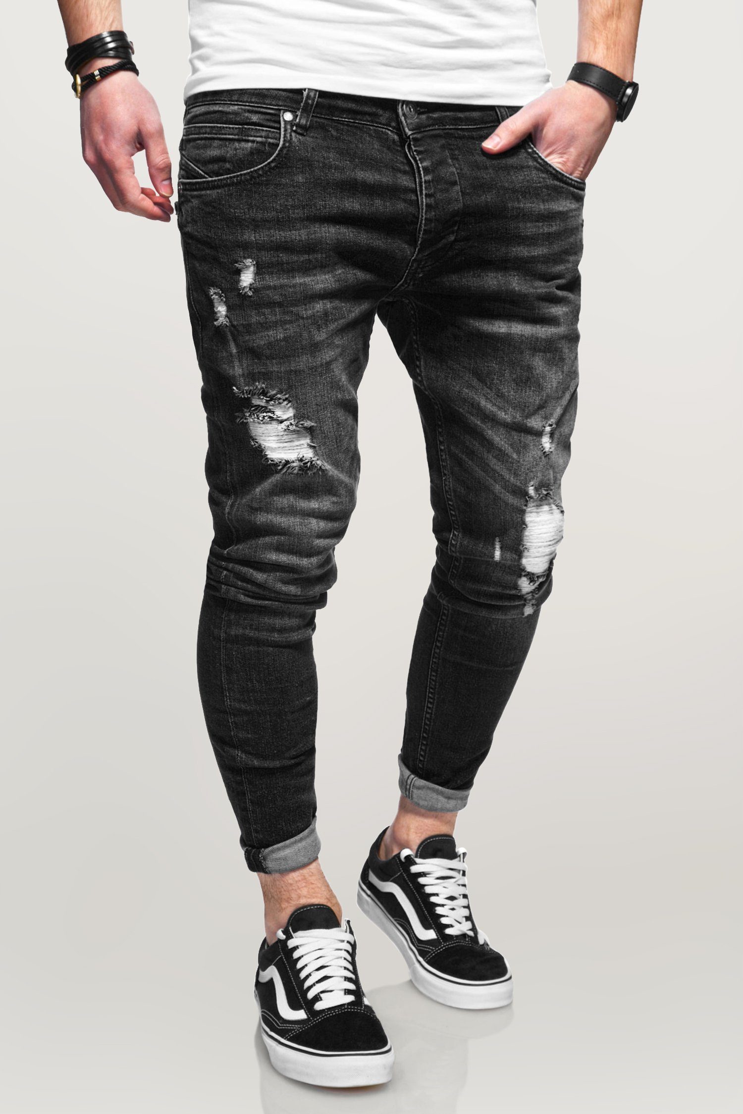 behype Slim-fit-Jeans ODIN mit schwarz Destroyed-Parts