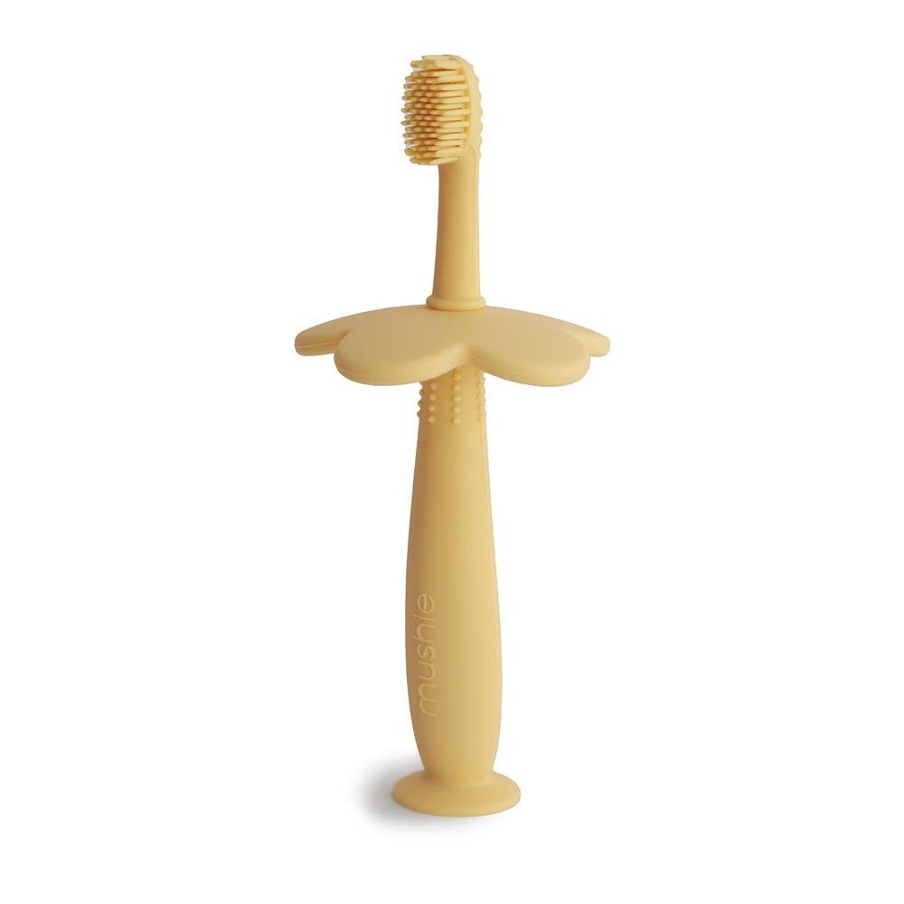 Mushie Lernzahnbürste Blume Pale Daffodil, aus Silikon, mit Saugnapf, für Kinder und Babys