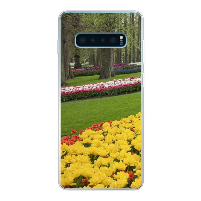 MuchoWow Handyhülle Blumen im Gras auf dem Keukenhof in Holland. Phone Case Handyhülle Samsung Galaxy S10 Lite Silikon Schutzhülle