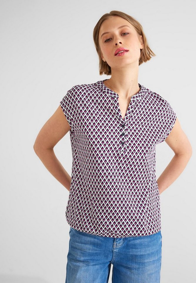 Rundhalsausschnitt Schultern, überschnittenen Print-Shirt mit STREET Geschlitzter ONE
