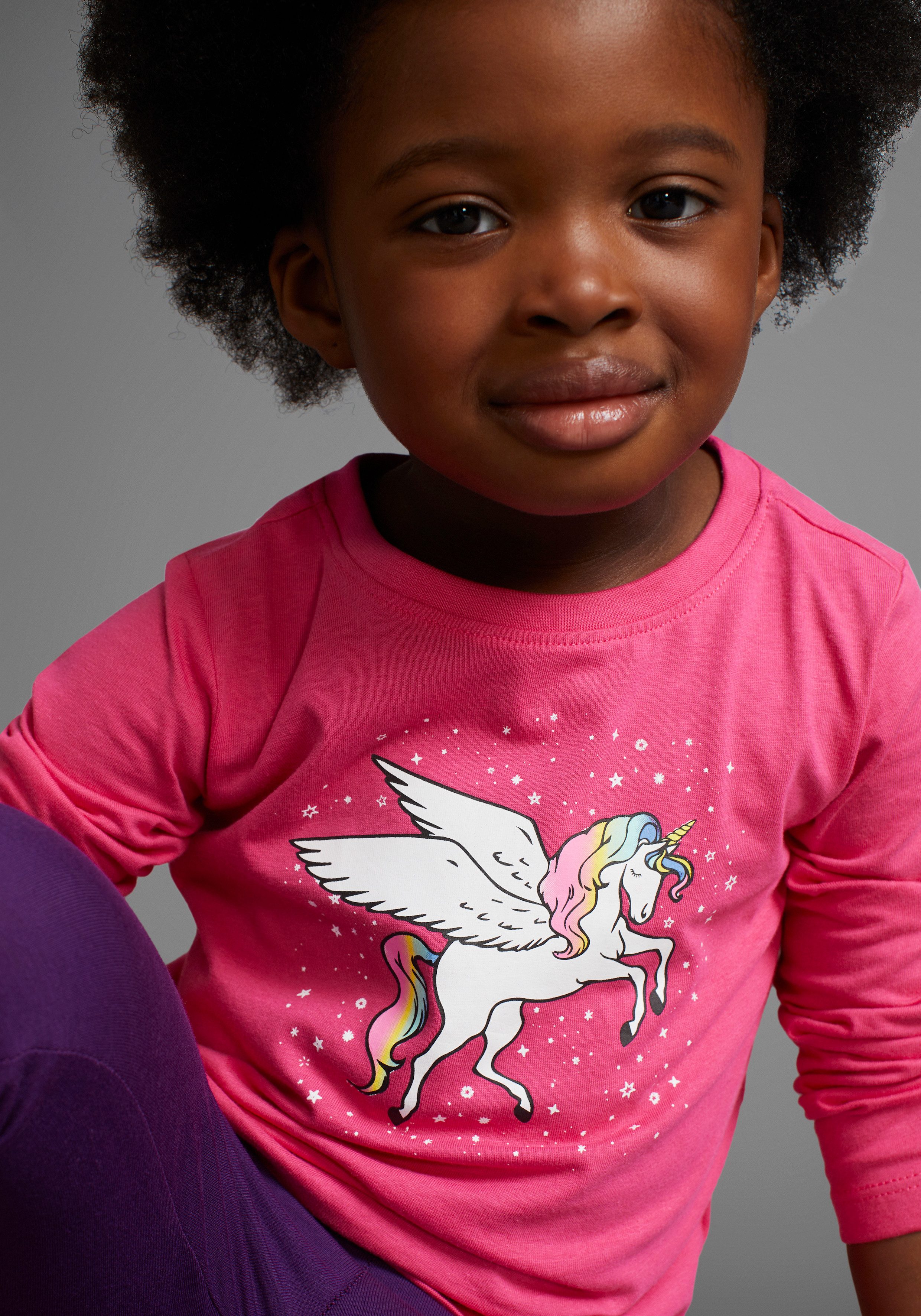 KIDSWORLD Langarmshirt mit süßem Einhorn Druck langärmlig, hüftlange Passform, stylischer Druck