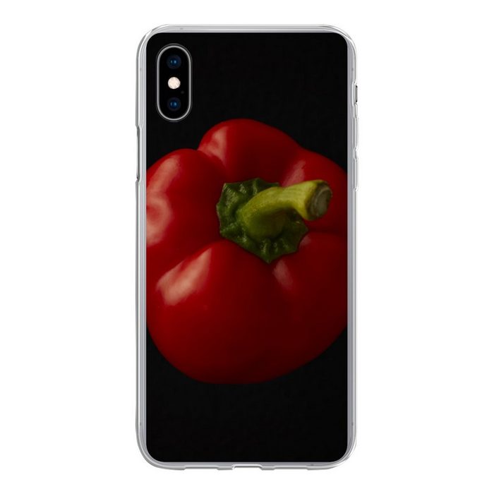 MuchoWow Handyhülle Eine rote Paprika auf schwarzem Hintergrund Handyhülle Apple iPhone Xs Smartphone-Bumper Print Handy
